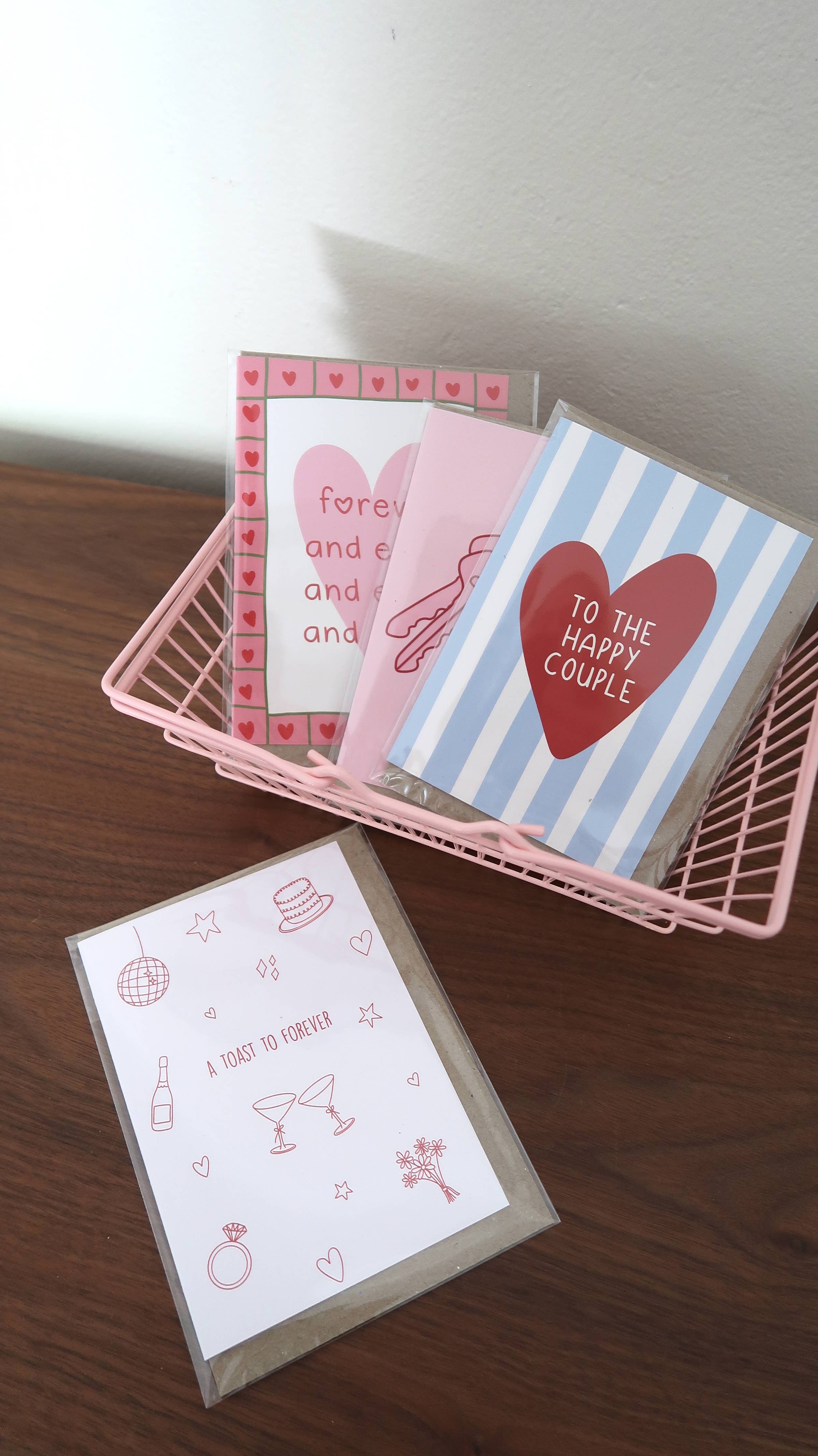 Wedding and engagement love card featuring elegant design from From Rosalie with "Toast To Forever" message.