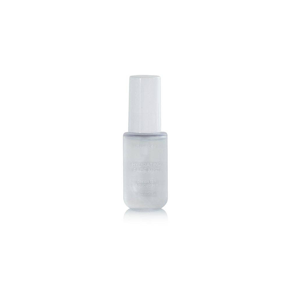 Huxter 30ml hydrating face mist with green tea and cucumber, shown in a clear spray bottle with a white label.