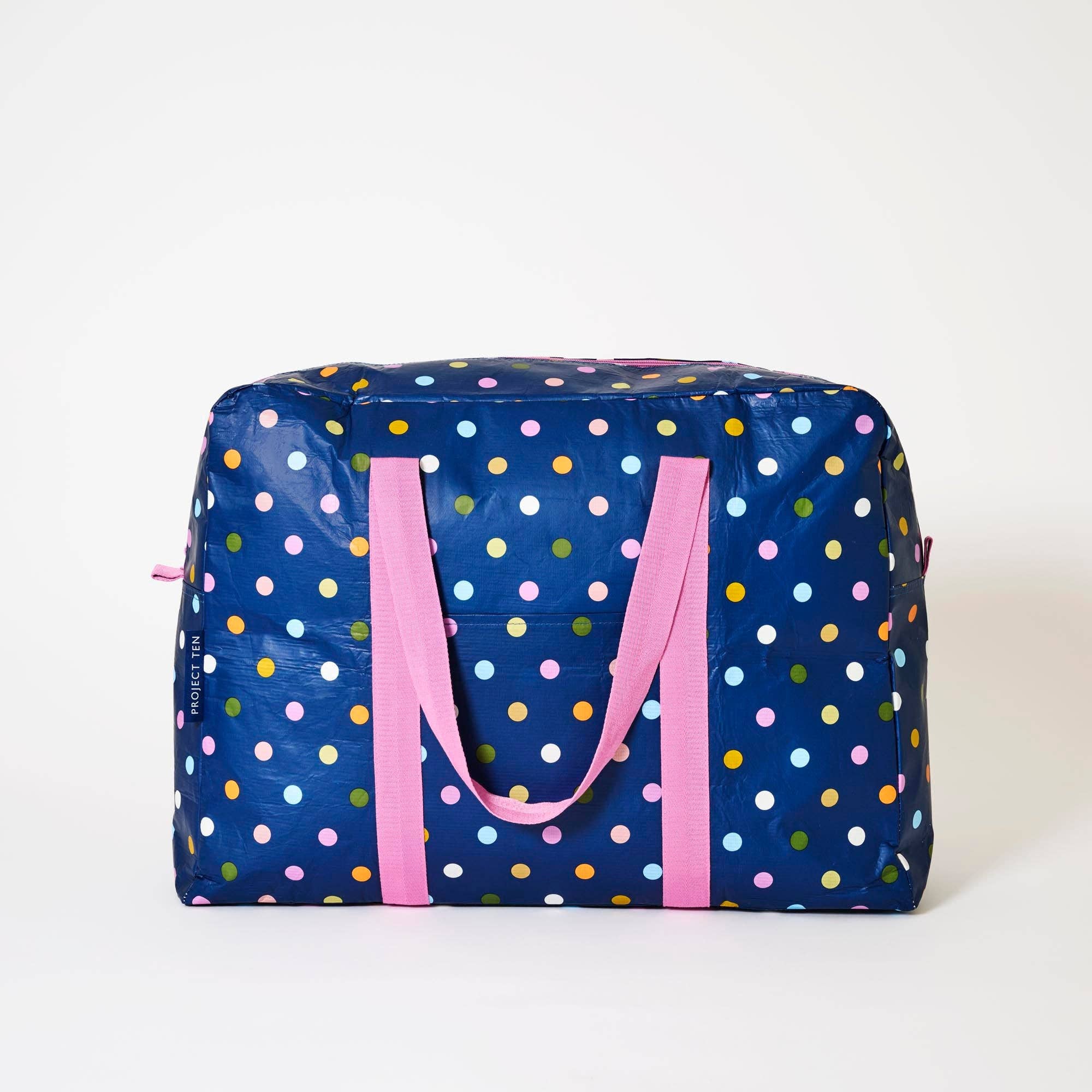 Project Ten Pty Ltd overnight bag with colorful confetti design, spacious travel bag with sturdy handles and zip closure.