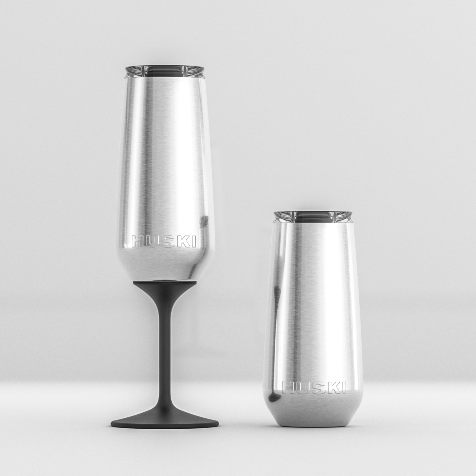 Huski white champagne flute with a clear glass body and a sturdy base, designed for elegant champagne serving.