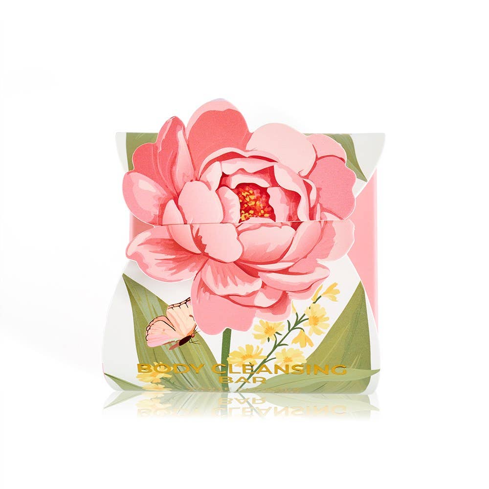 Huxter body cleansing bar gift box with pink flower, white florals, and French pear scent, featuring two beautifully wrapped soap bars.