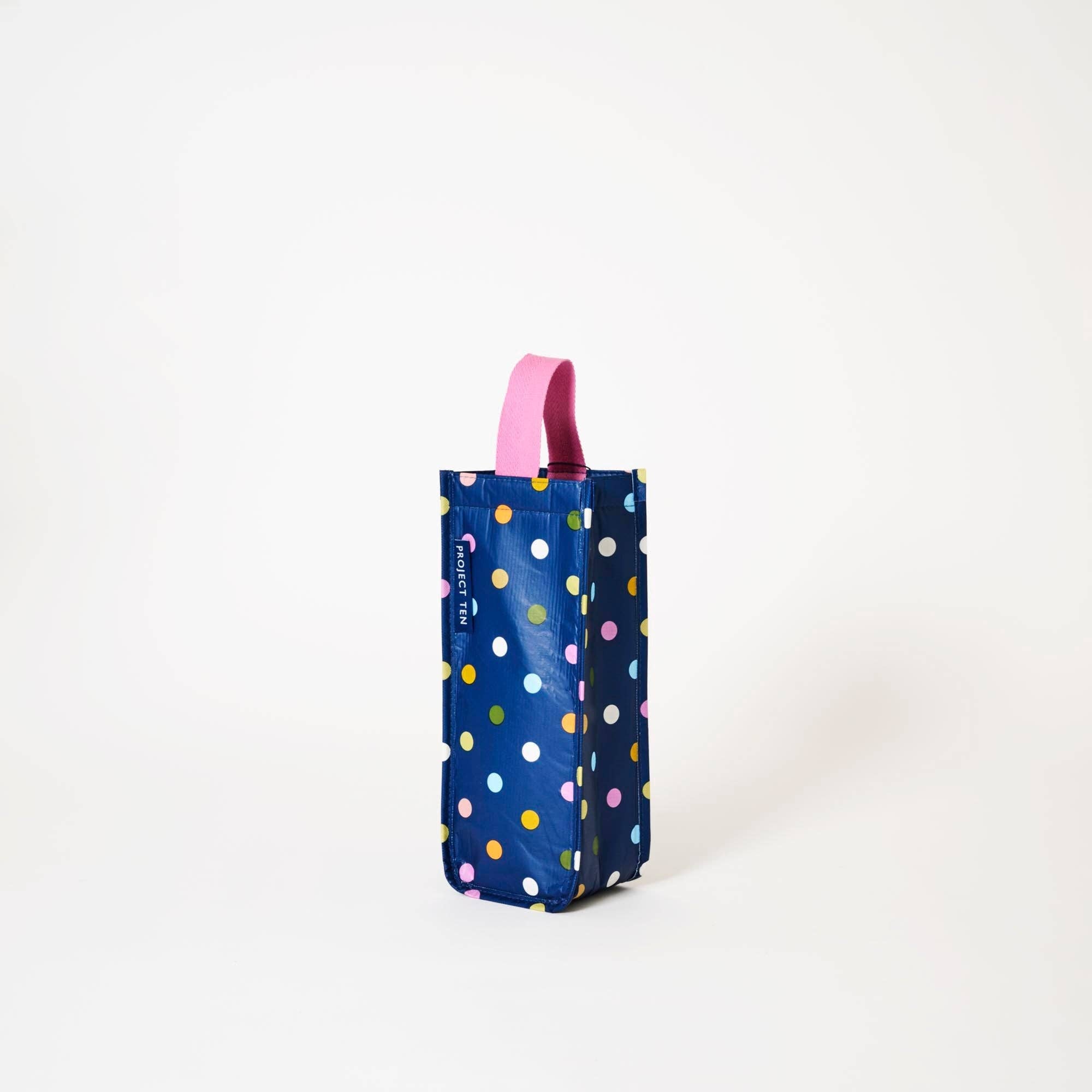 Colorful confetti-themed wine bag by Project Ten Pty Ltd, featuring vibrant design and sturdy handle for gift wrapping.