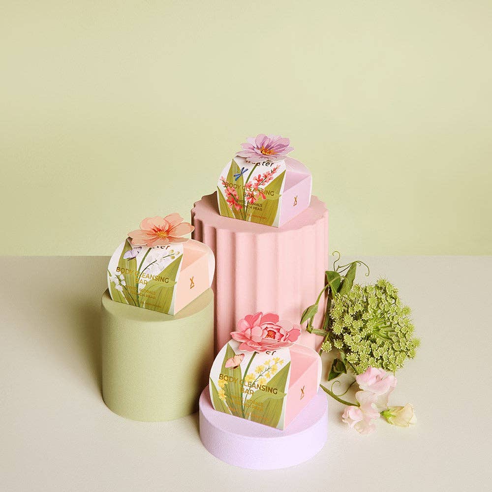 Huxter Body Cleansing Bar Gift Box with pink flower, white florals, and French pear scents, featuring elegant soap bars in a decorative box