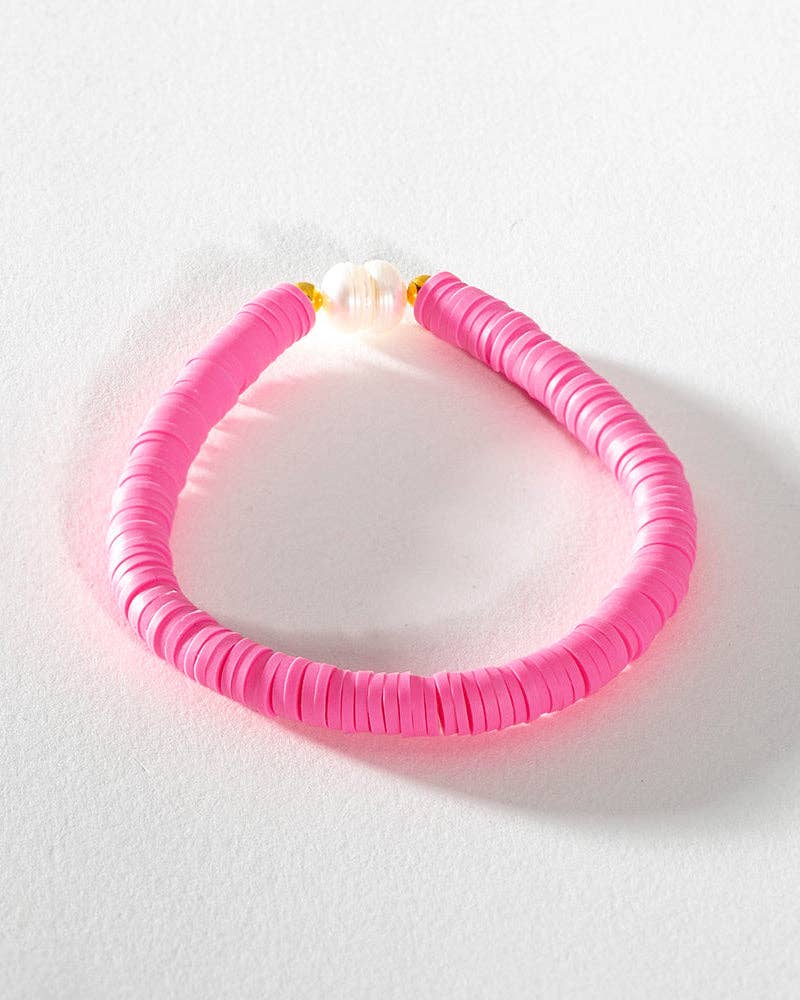Pearl Pop Heishi Bead Bracelet by Greenwood Designs featuring white pearl and colorful heishi beads on an adjustable cord