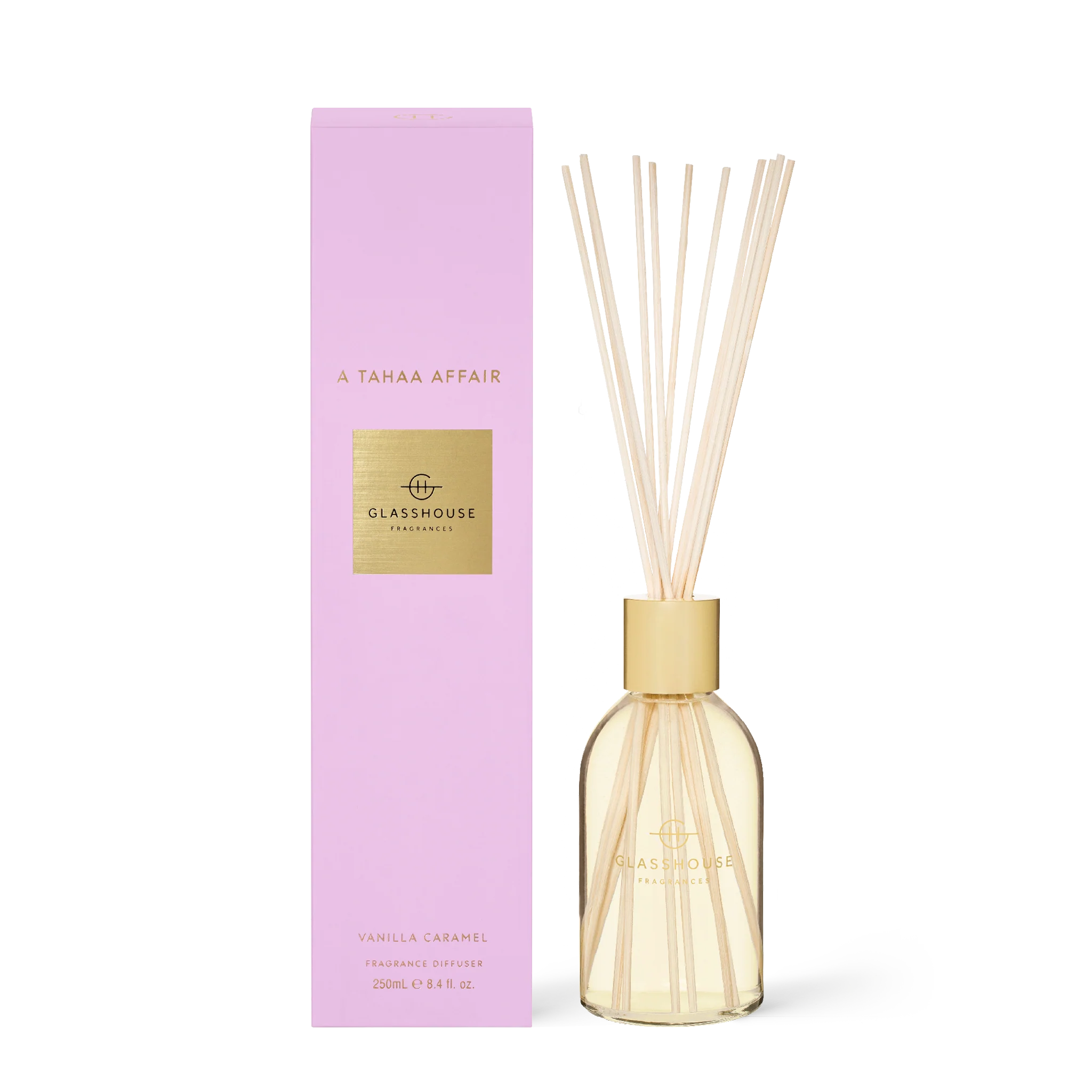 Glasshouse Fragrances Tahaa Affair diffuser with elegant glass bottle and reed sticks for a tropical floral scent.