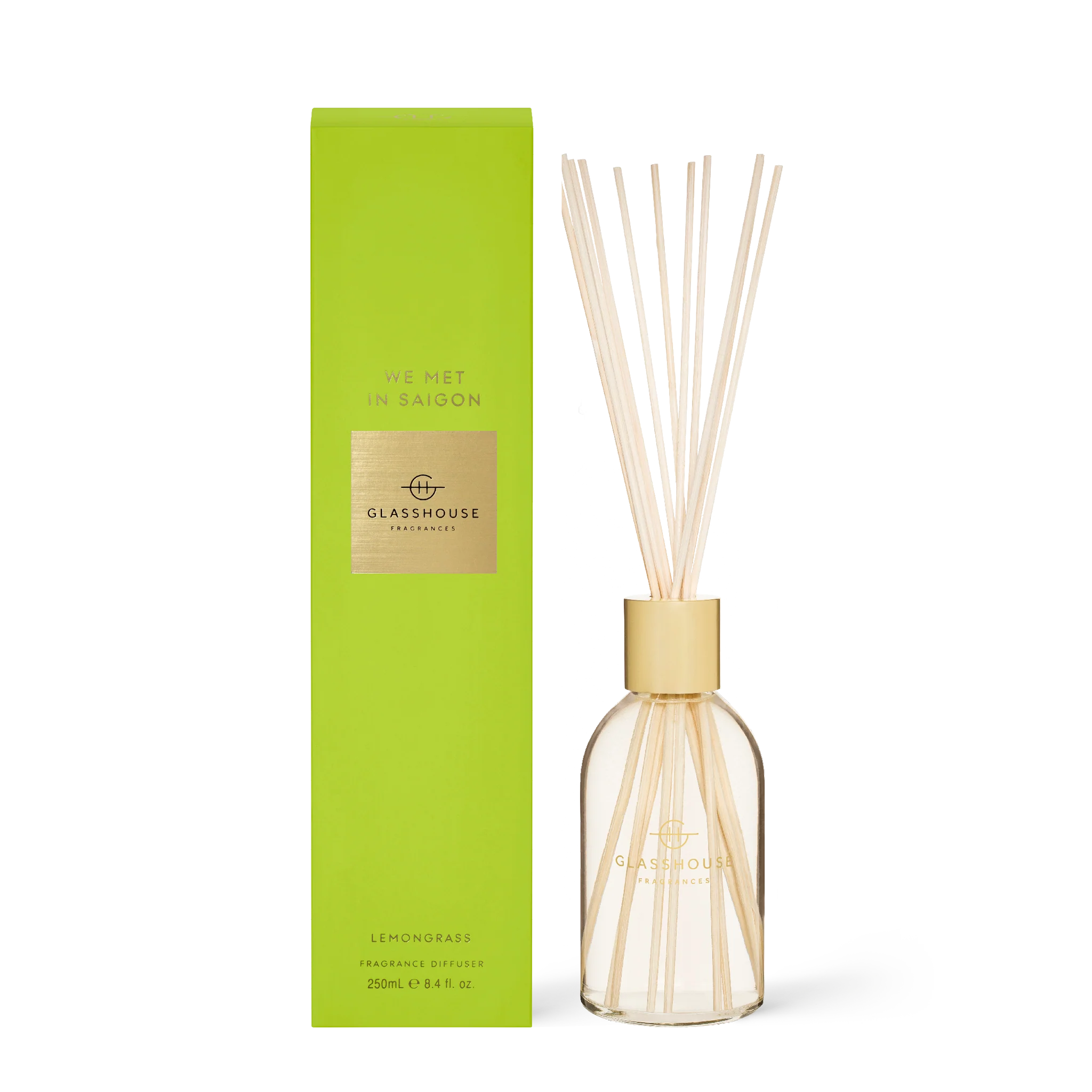 Glasshouse Fragrances We Met in Saigon diffuser with floral and citrus accents in a sleek glass container.
