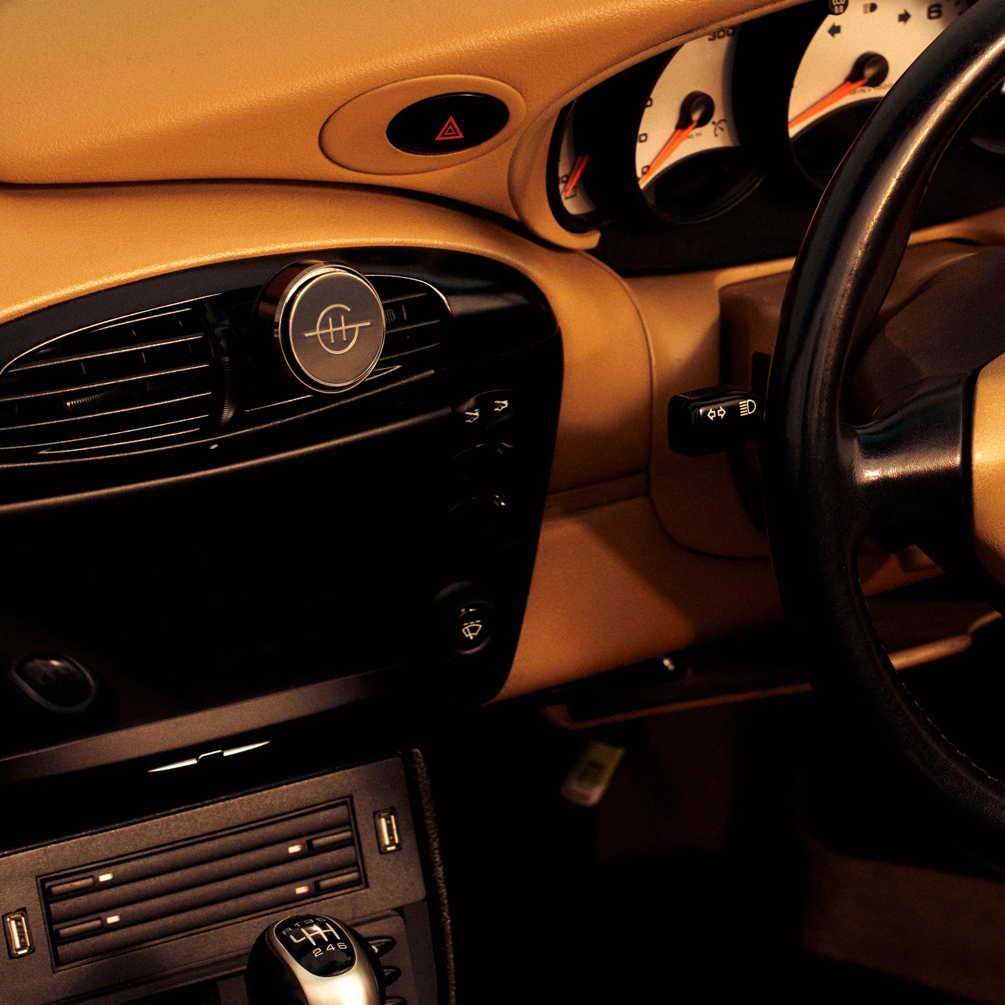 Glasshouse Fragrances Car Diffuser in Lost in Amalfi scent, featuring a sleek design with floral and citrus accents.