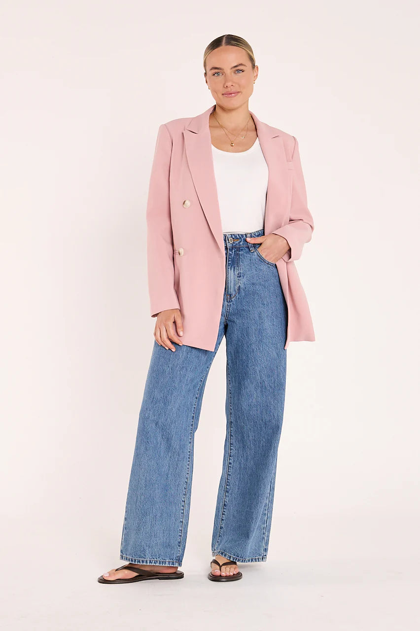 Feather + Noise Hayley Blazer in sweet pink, tailored women's blazer with lapels and button closure, styled on a model.