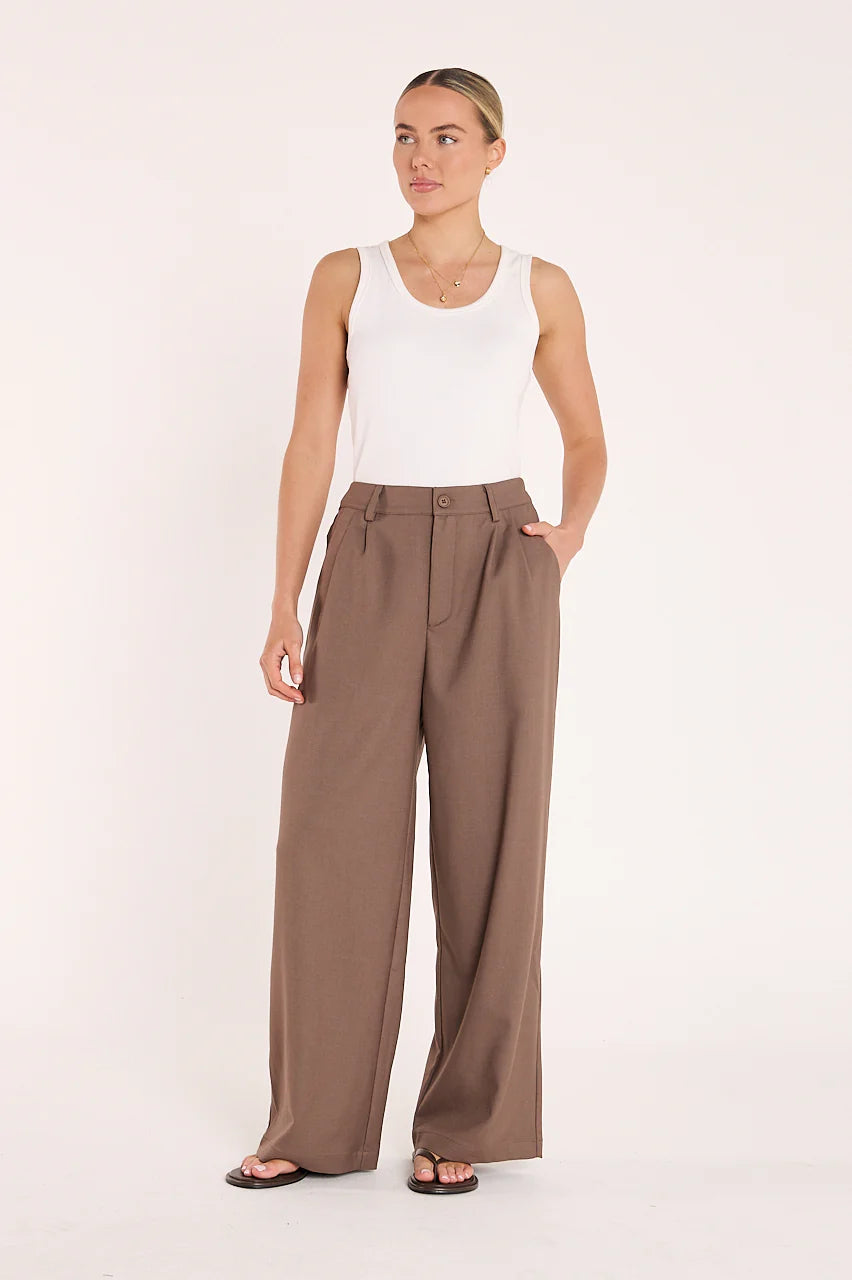 Feather + Noise Carmen Pant in chocolate color, stylish women's pants with a relaxed fit, shown in a front view.