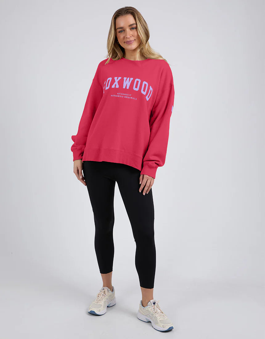 Foxwood Interval Crew sock in Raspberry and Neon Lilac with colorful striped pattern, displayed flat on a white background.