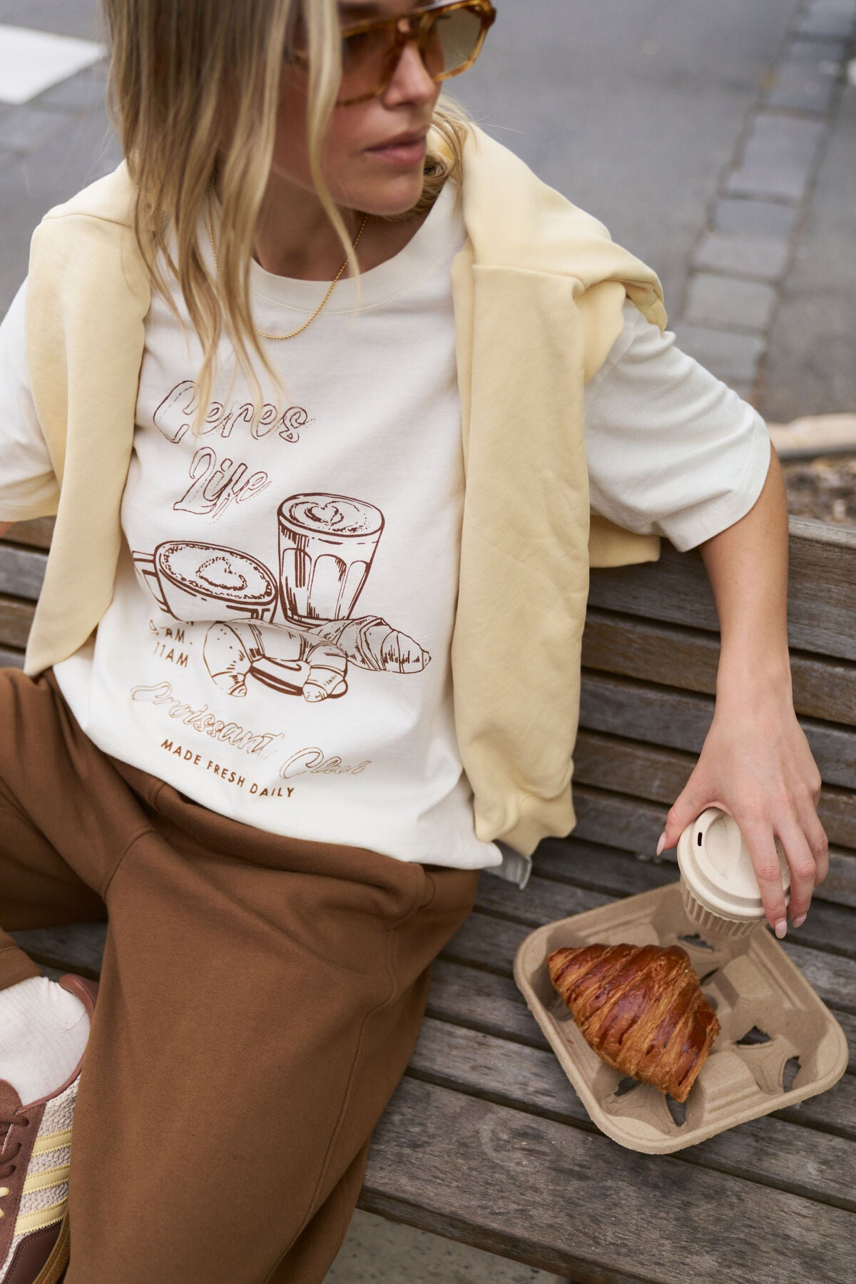 Ceres Life Stevie Slouchy Tee in Milk and Croissant Club colors, casual fit with soft fabric, displayed on a hanger.