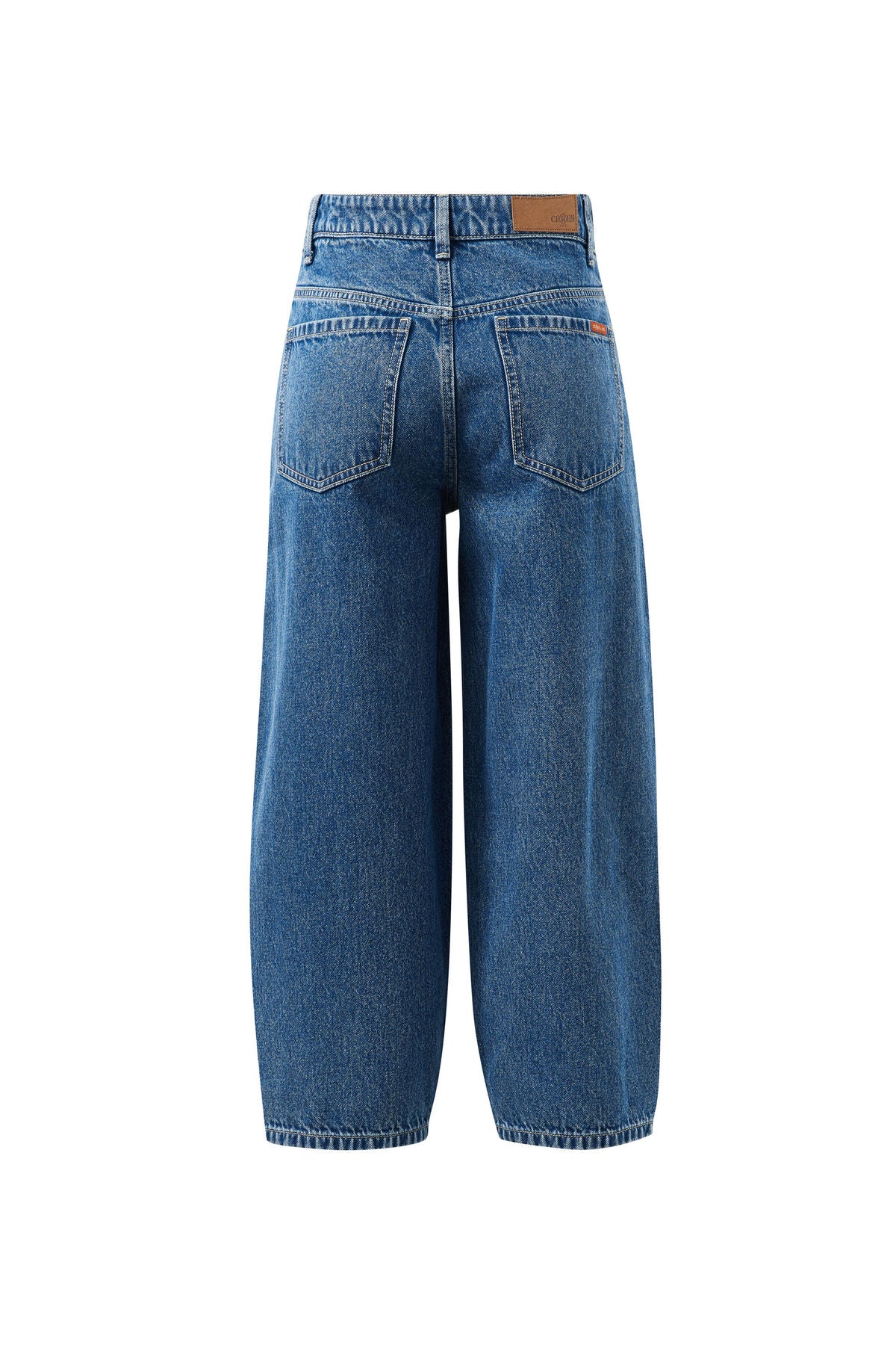 Ceres Life Maggie tapered barrel jeans in fresh indigo denim, displaying a close-up of the classic jean fabric and stitching.