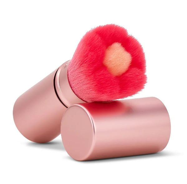 Retractable Kabuki Brush by Annabel Trends with meadow blush-colored bristles and sleek black handle.