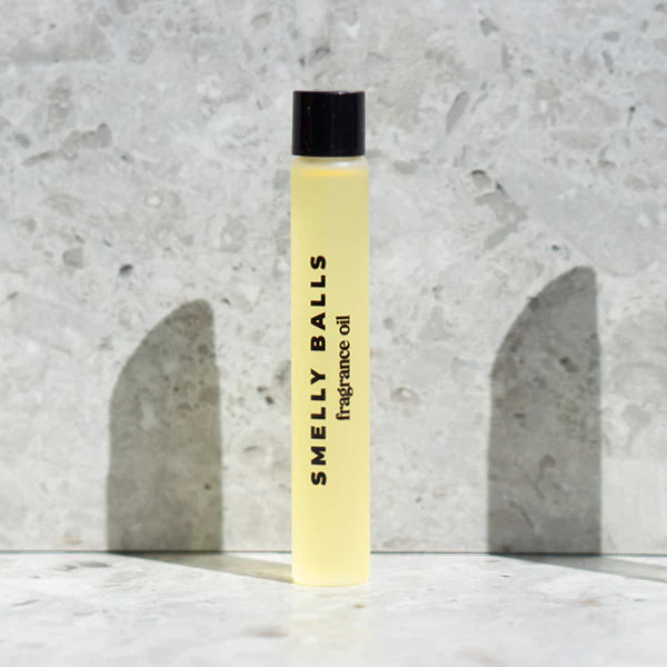 Smelly Balls Tobacco Vanilla fragrance oil bottle with label, featuring warm vanilla and smoky tobacco scent in a dark glass container.