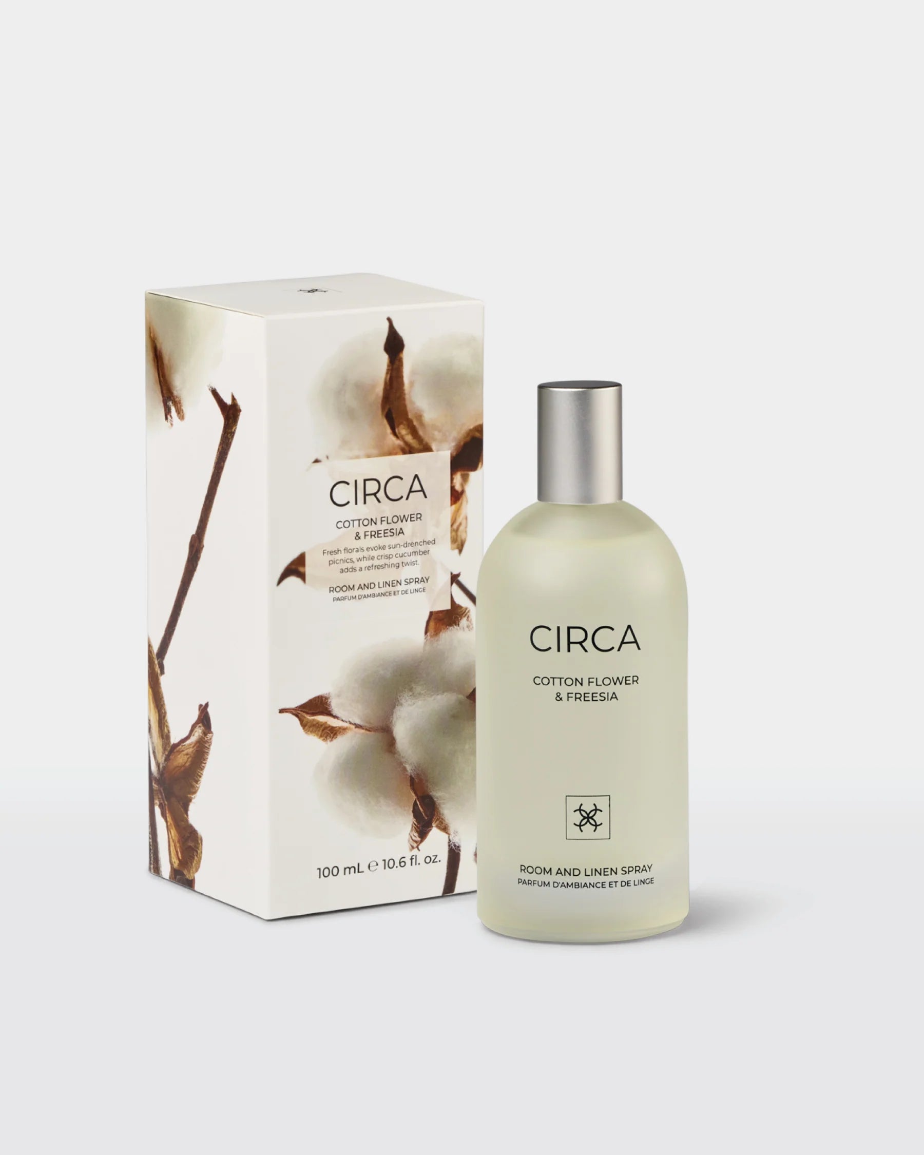 CIrca Cotton Flower & Freesia room and linen spray bottle, 100ml, with floral design and clear spray nozzle.