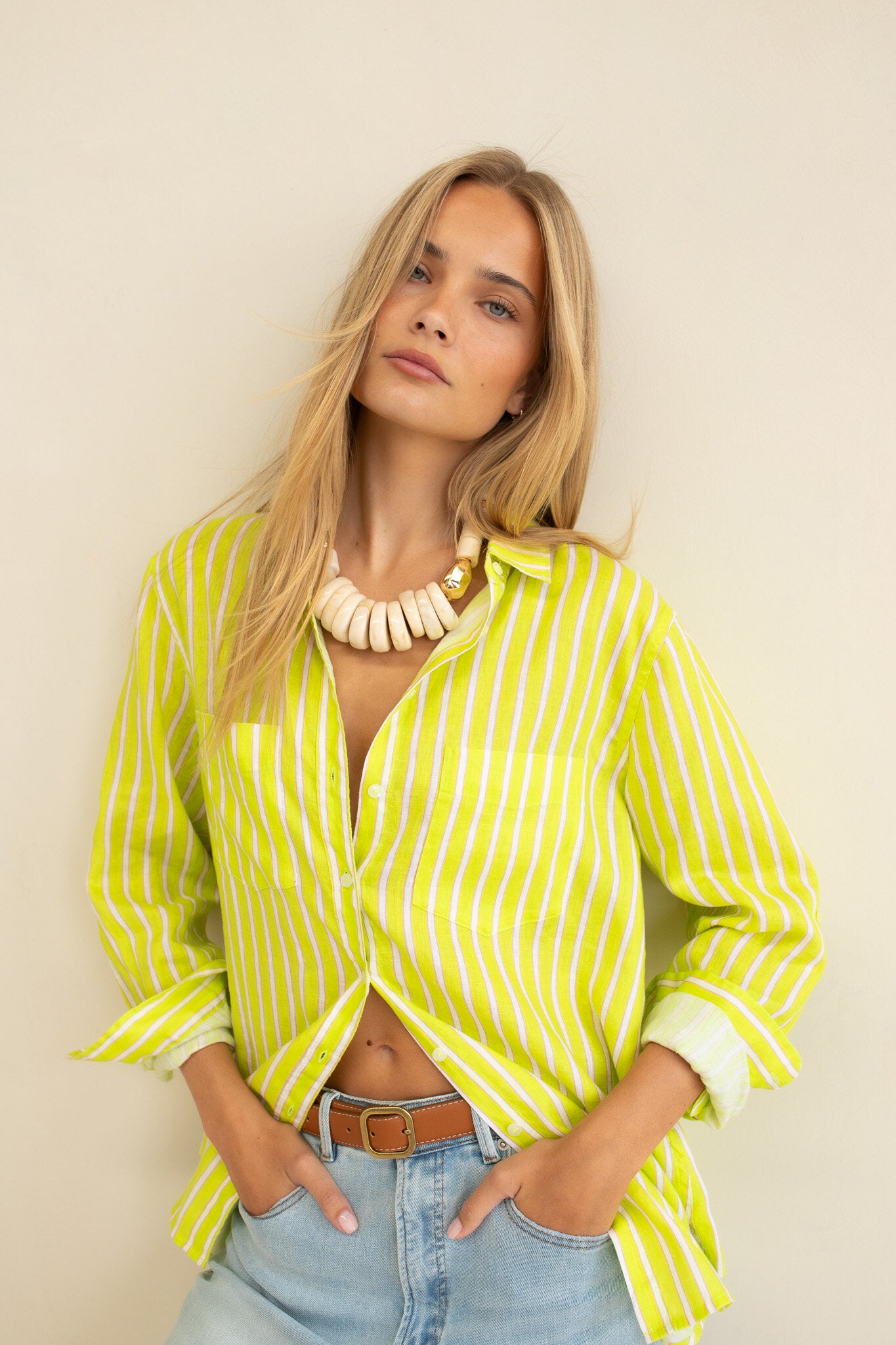 Piney Limey Stripe Boyfriend Linen Shirt by Hut Clothing, front view showing light green and white striped casual shirt for women.