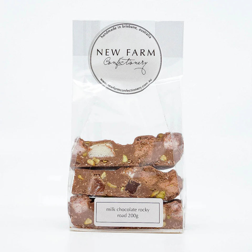 Milk chocolate Rocky Road by New Farm, 200g, featuring a mix of marshmallows, nuts, and chocolate chunks in a clear container.