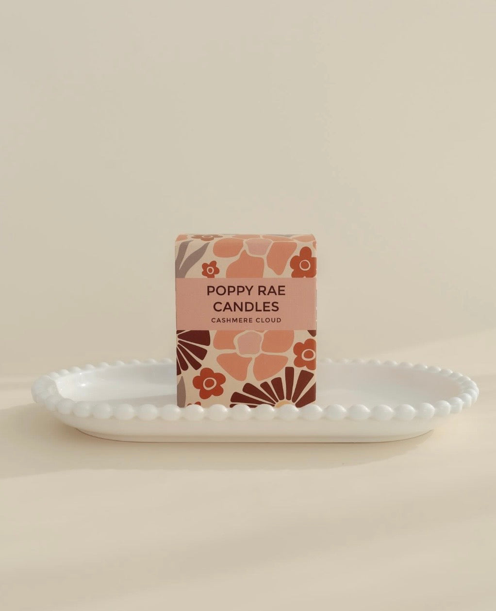 Poppy Rae Cashmere Cloud scented candle in 250g glass jar with a soft, cozy design and white wax.