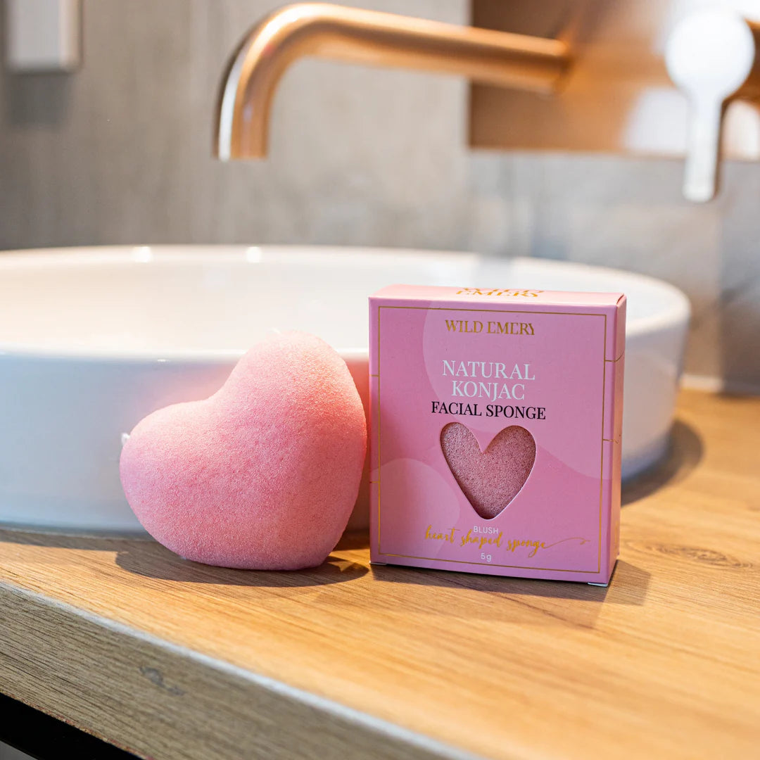 Wild Emery blush konjac sponge for gentle facial cleansing, featuring natural wild emery exfoliating texture.