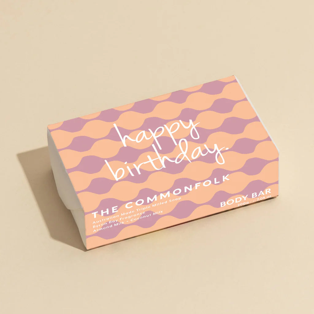 The Commonfolk Happy Birthday Body Bar with colorful birthday-themed design on a soap bar.