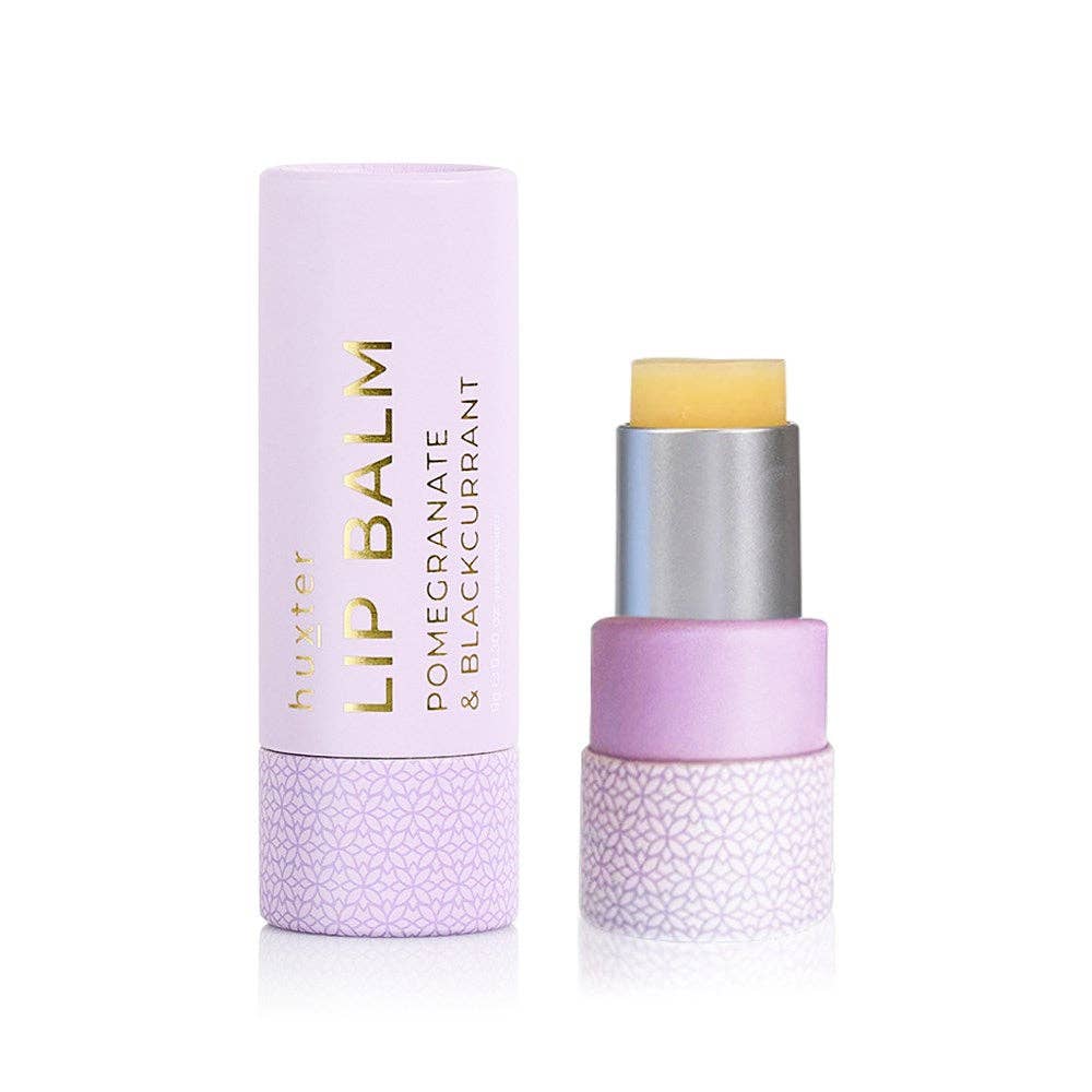 Huxter pomegranate and blackcurrant lip balm in mauve, 9g, with smooth texture and natural ingredients.