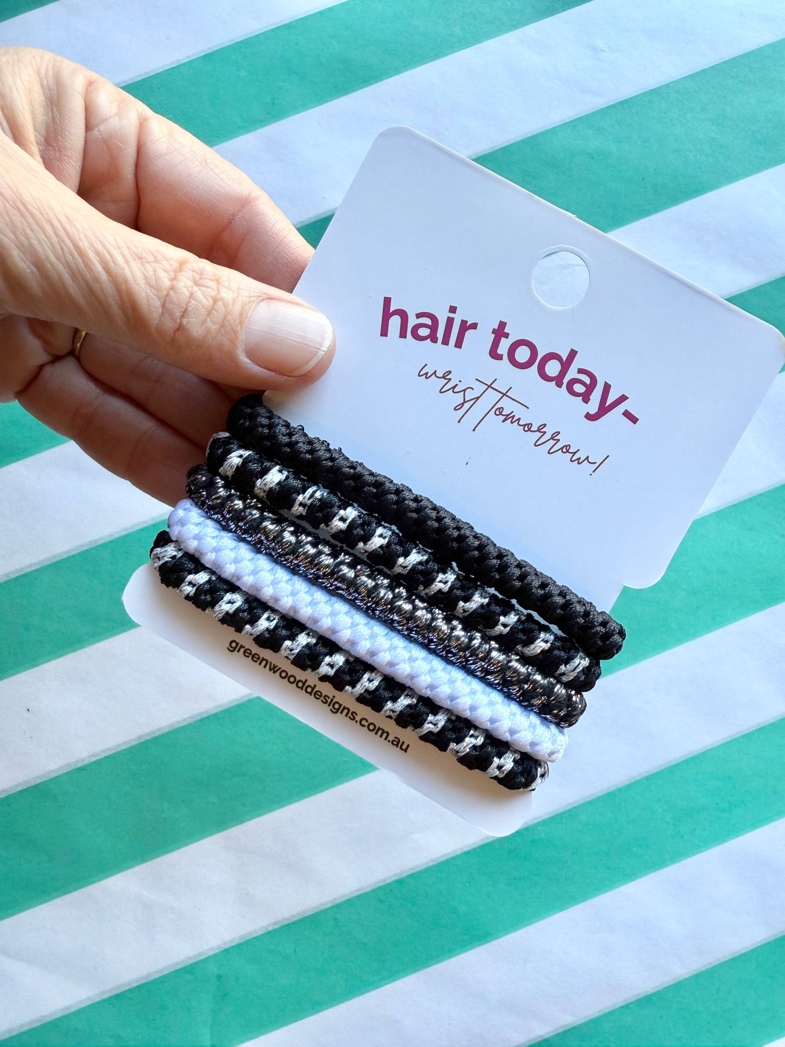 Greenwood Designs Hair Elastics Pack featuring colorful, stretchy elastic bands for hair styling and securing hairstyles.