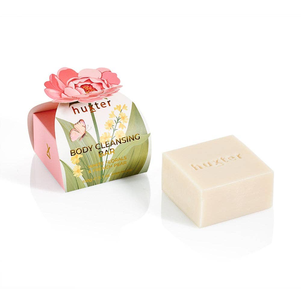 Huxter body cleansing bar gift box with pink flower design, featuring white floral and French pear scents.