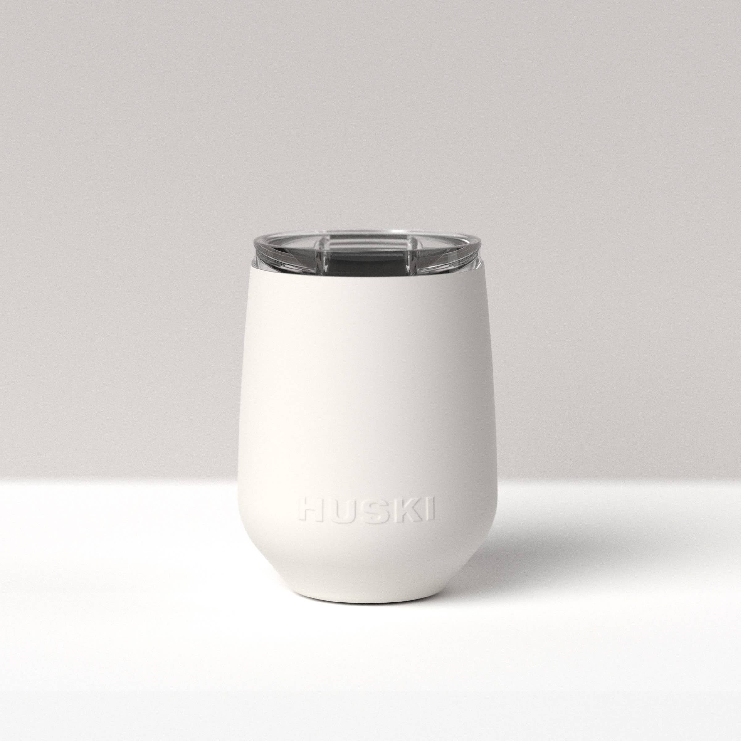 Huski Wine Tumbler 2.0 in white, insulated stainless steel wine cup with lid, designed for outdoor and indoor use
