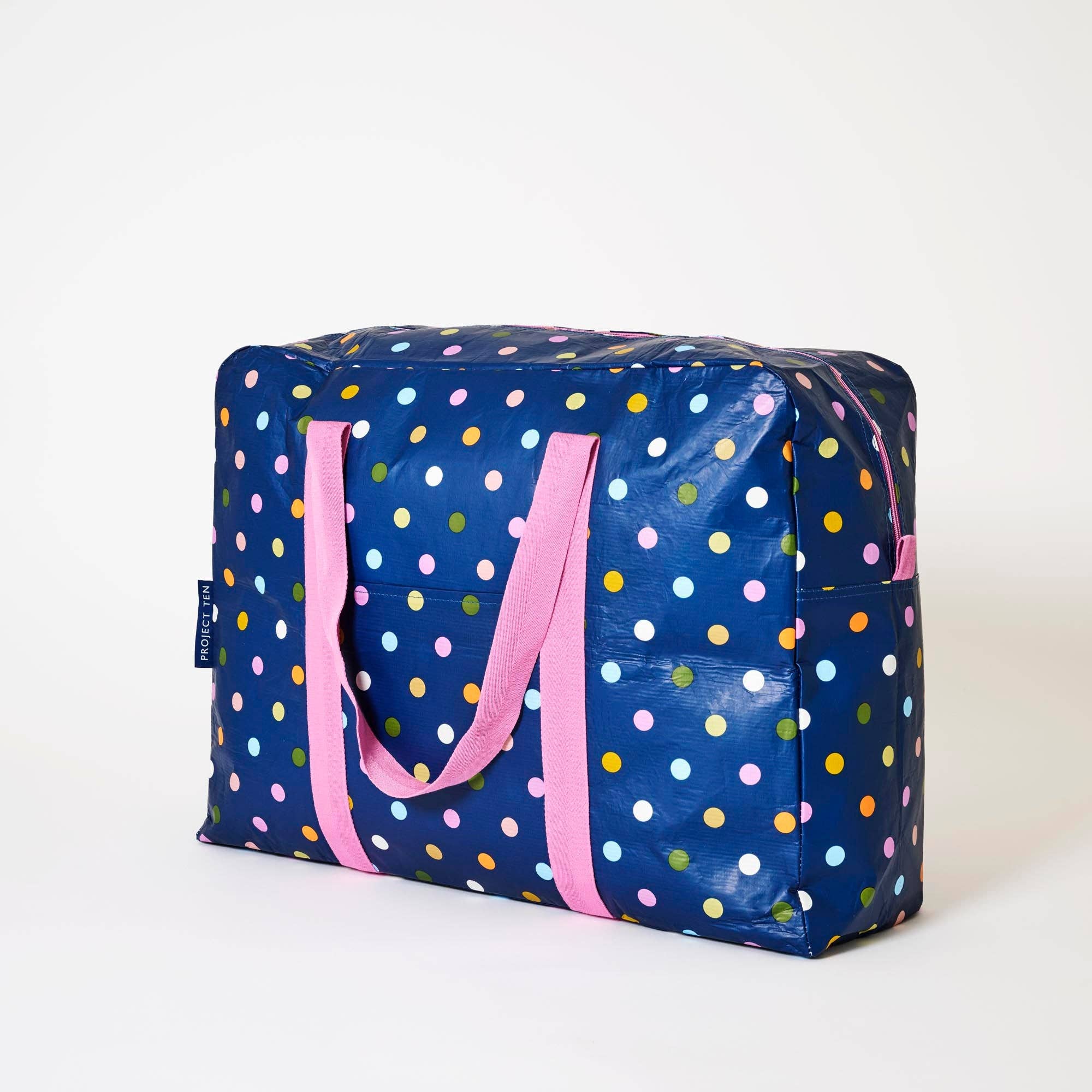 Confetti overnight bag by Project Ten Pty Ltd showing a stylish, spacious tote with colorful confetti pattern and sturdy handles.