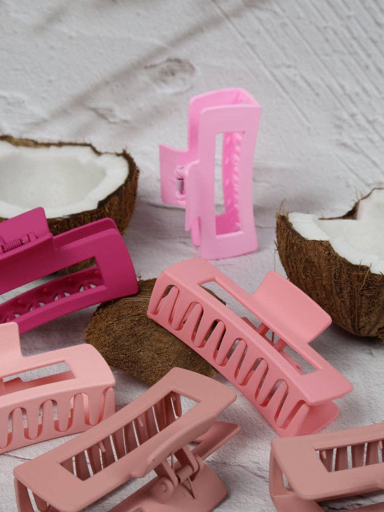 Medium elongated rectangle claw clip by Nakoa The Label featuring a strawberry shortcake design, perfect for securing hair.