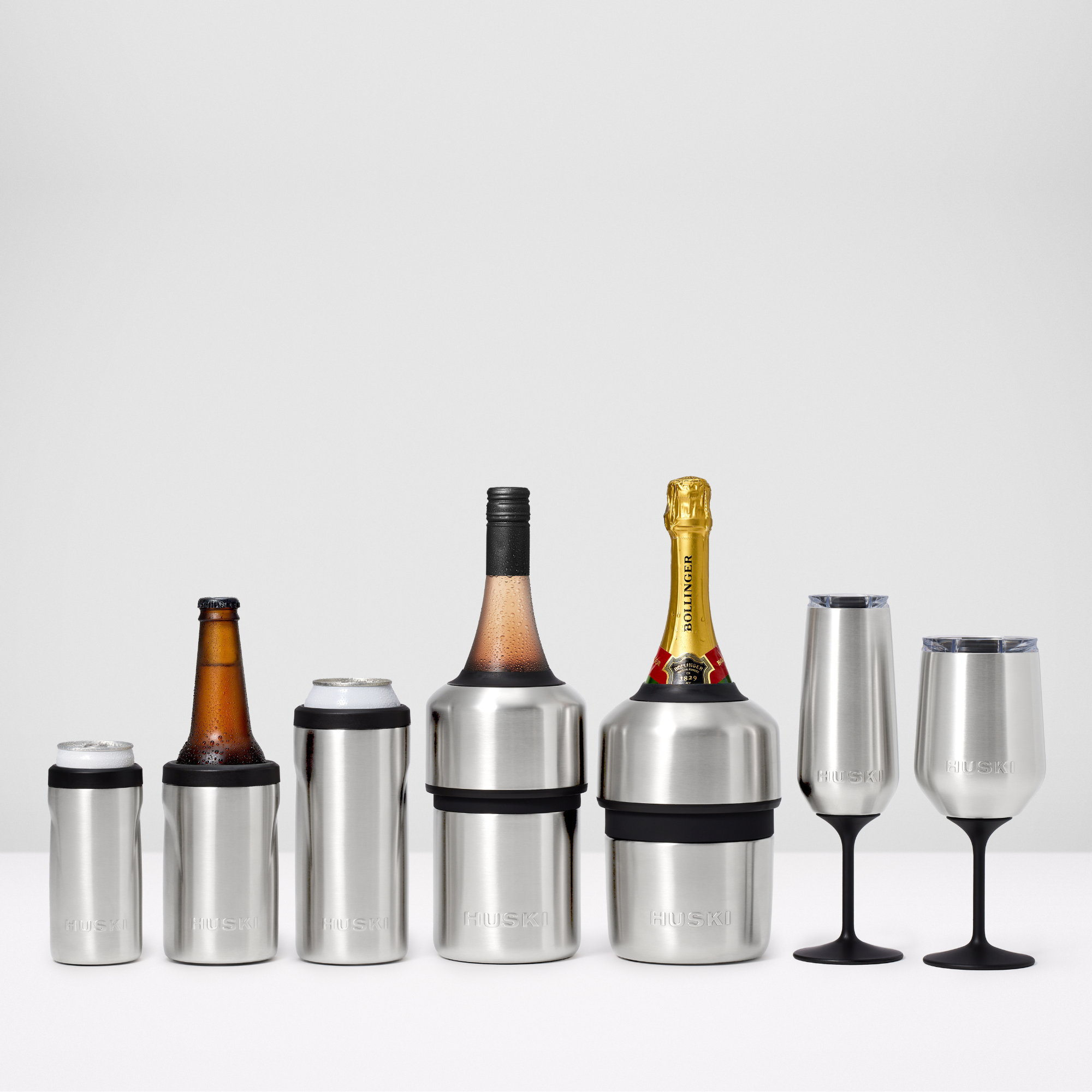 Huski Wine Tumbler 2.0 in white with sleek, insulated design suitable for wine and beverages, featuring a clear lid and modern style.