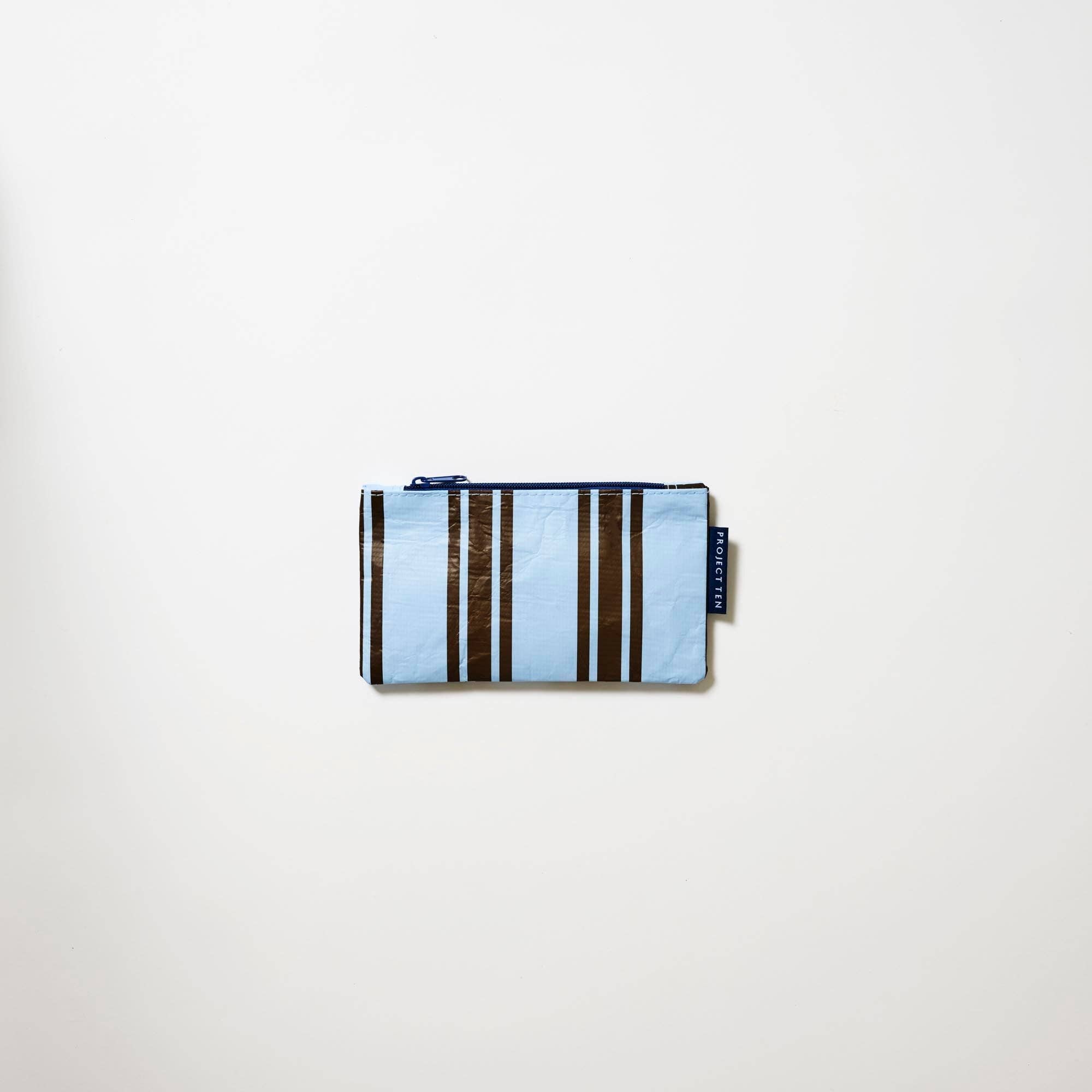 Tiny Zip Pouch in Oxford Stripe by Project Ten Pty Ltd, close-up of compact pouch with zip closure and striped fabric design.