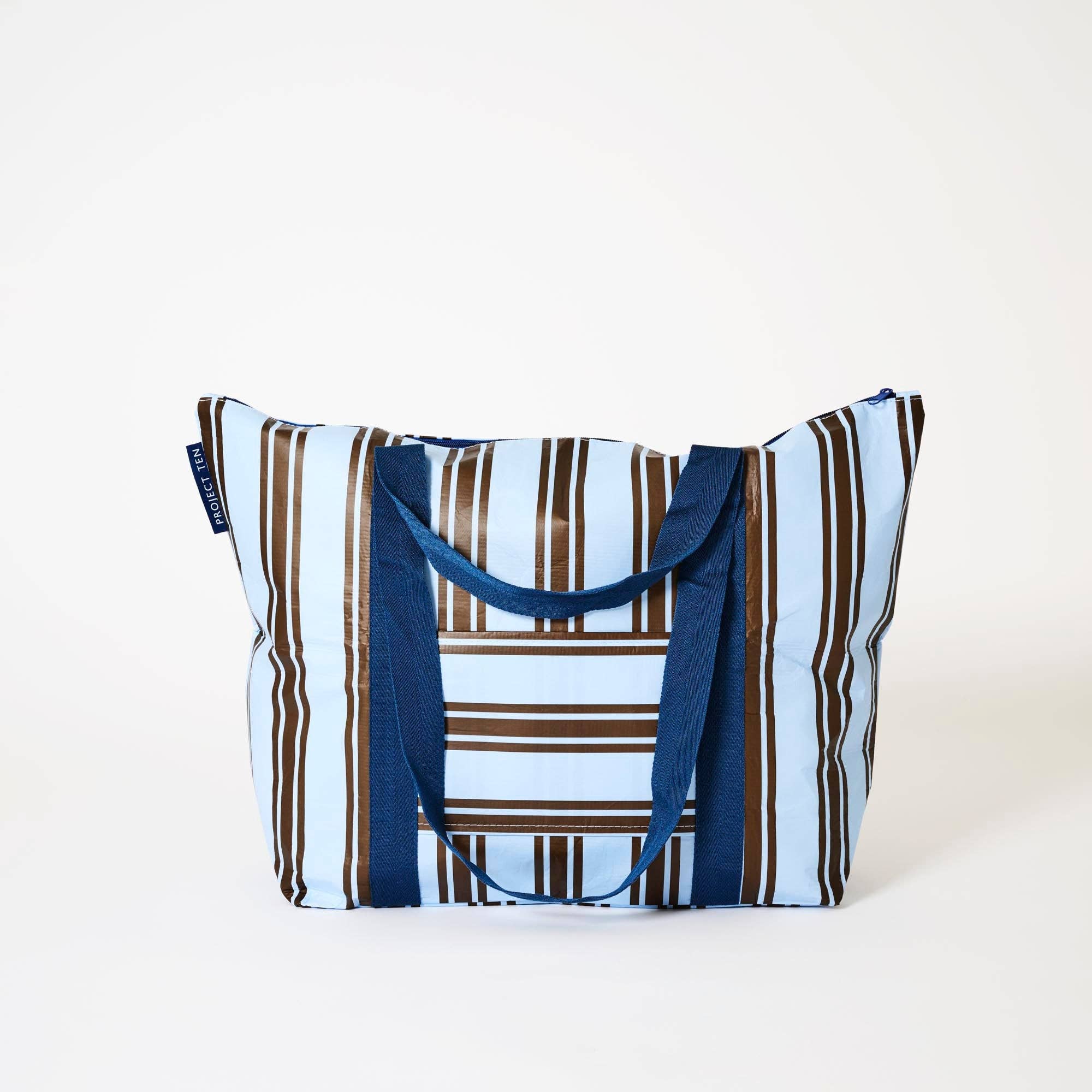 Medium tote bag with Oxford stripe design by Project Ten Pty Ltd, featuring sturdy handles and spacious interior.