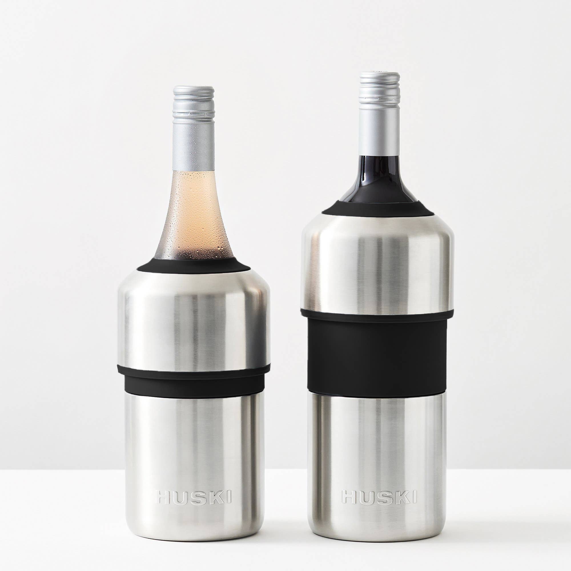 Huski Powder Pink Wine Cooler with sleek design, insulated exterior, and open top for chilling wine bottles.
