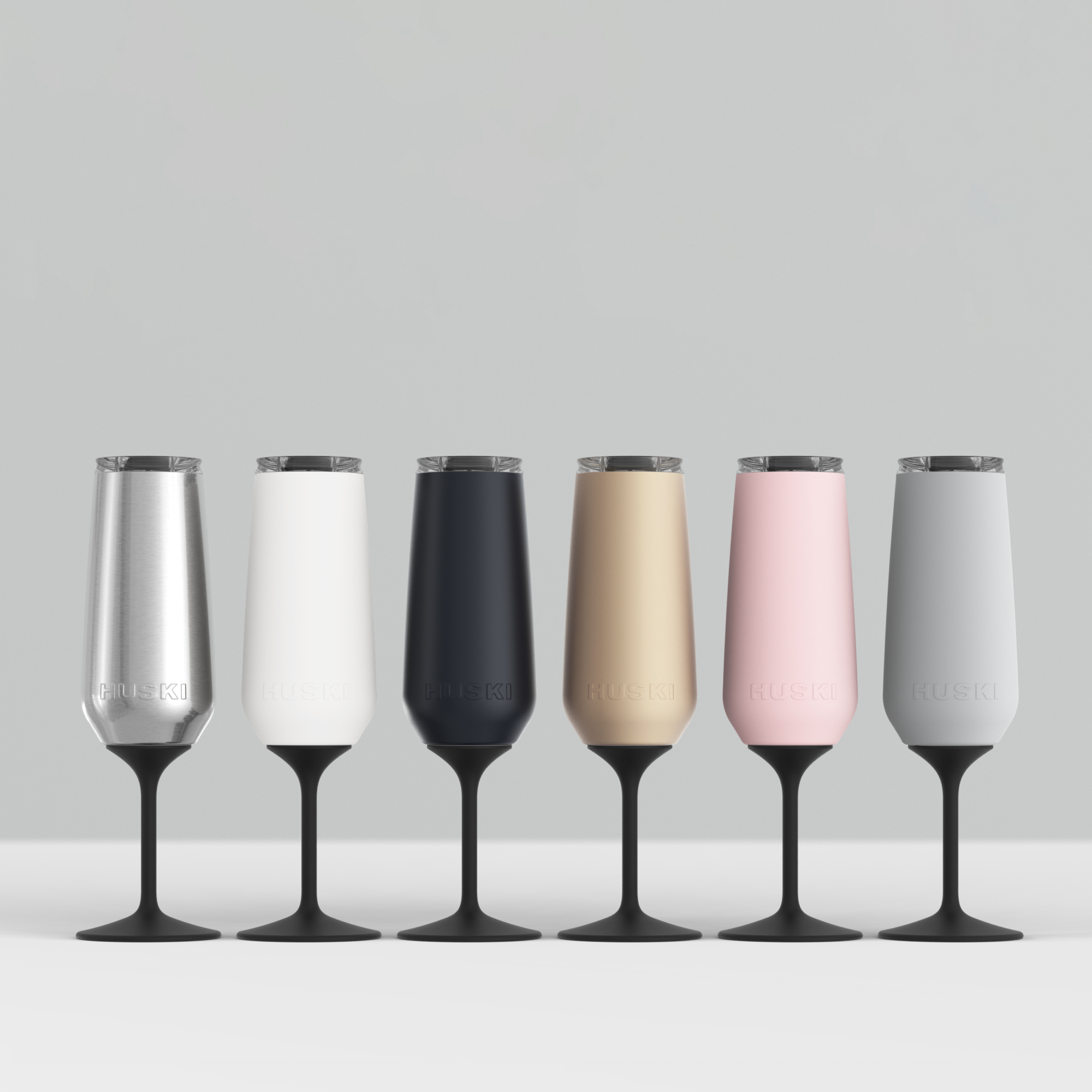 Huski Champagne Flute in white, clear glass with a sleek design, perfect for enjoying sparkling wine celebrations.