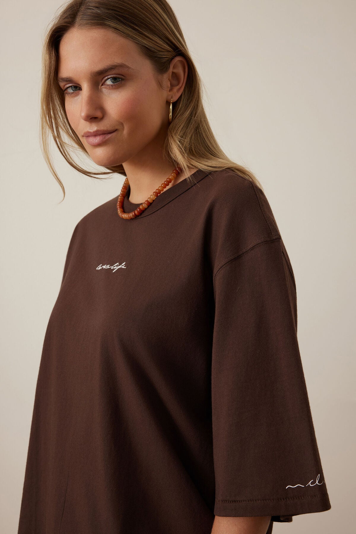 Liv Oversized Tee by Ceres Life in chocolate with Ceres script, featuring a relaxed fit and casual style.