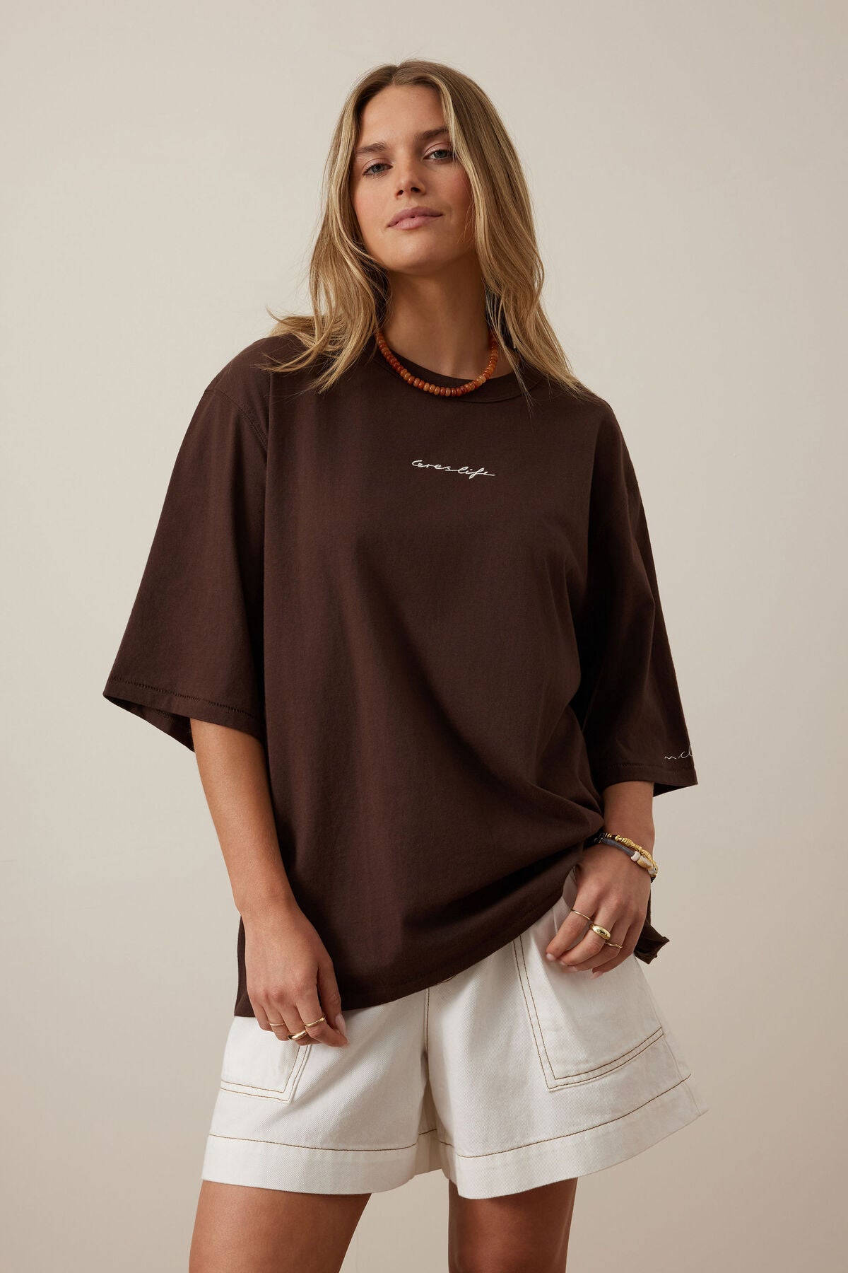 Liv oversized chocolate T-shirt by Ceres Life with Ceres Script design displayed on a casual fit tee.