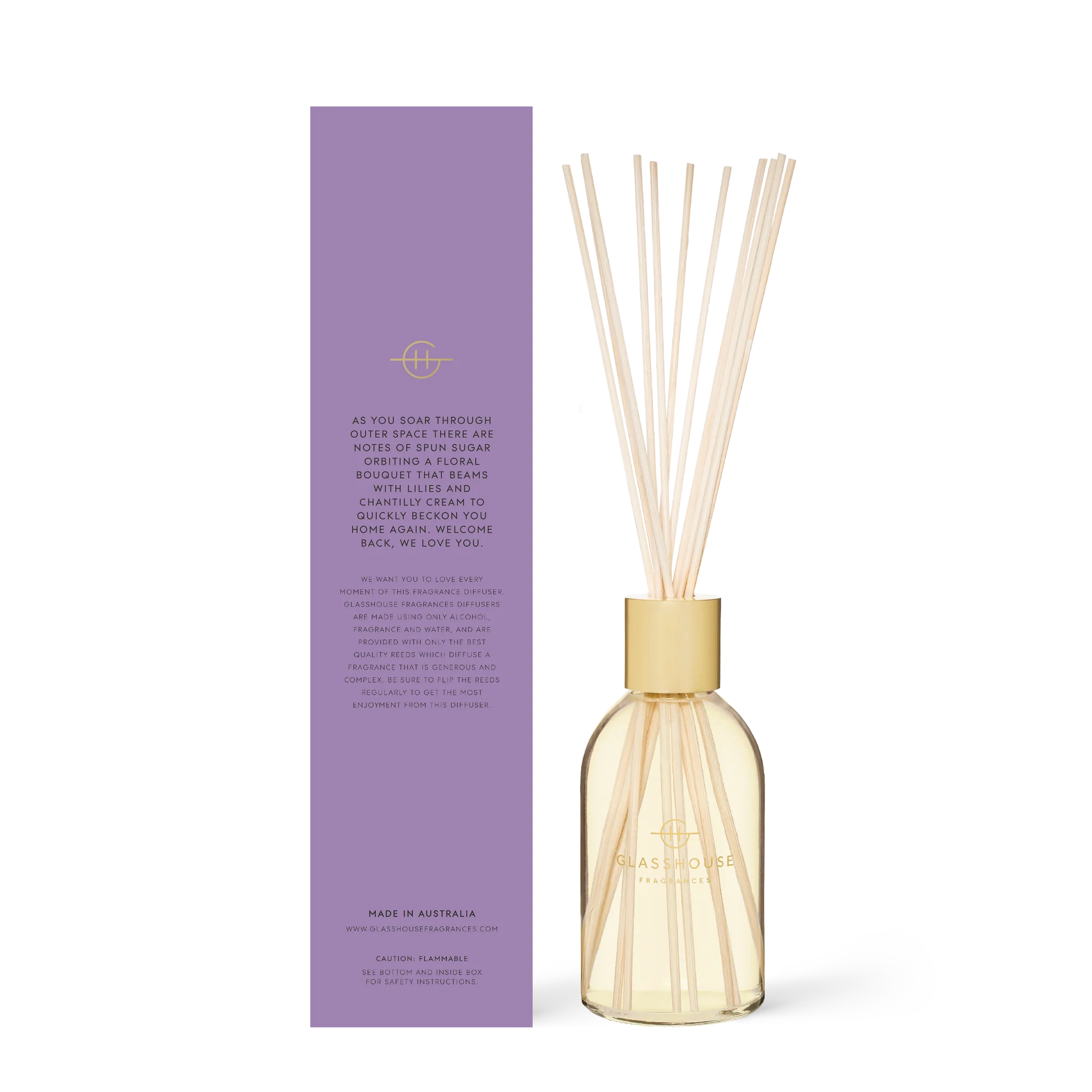Glasshouse Fragrances Moon and Back Diffuser with sleek glass bottle and elegant reed sticks for home fragrance.