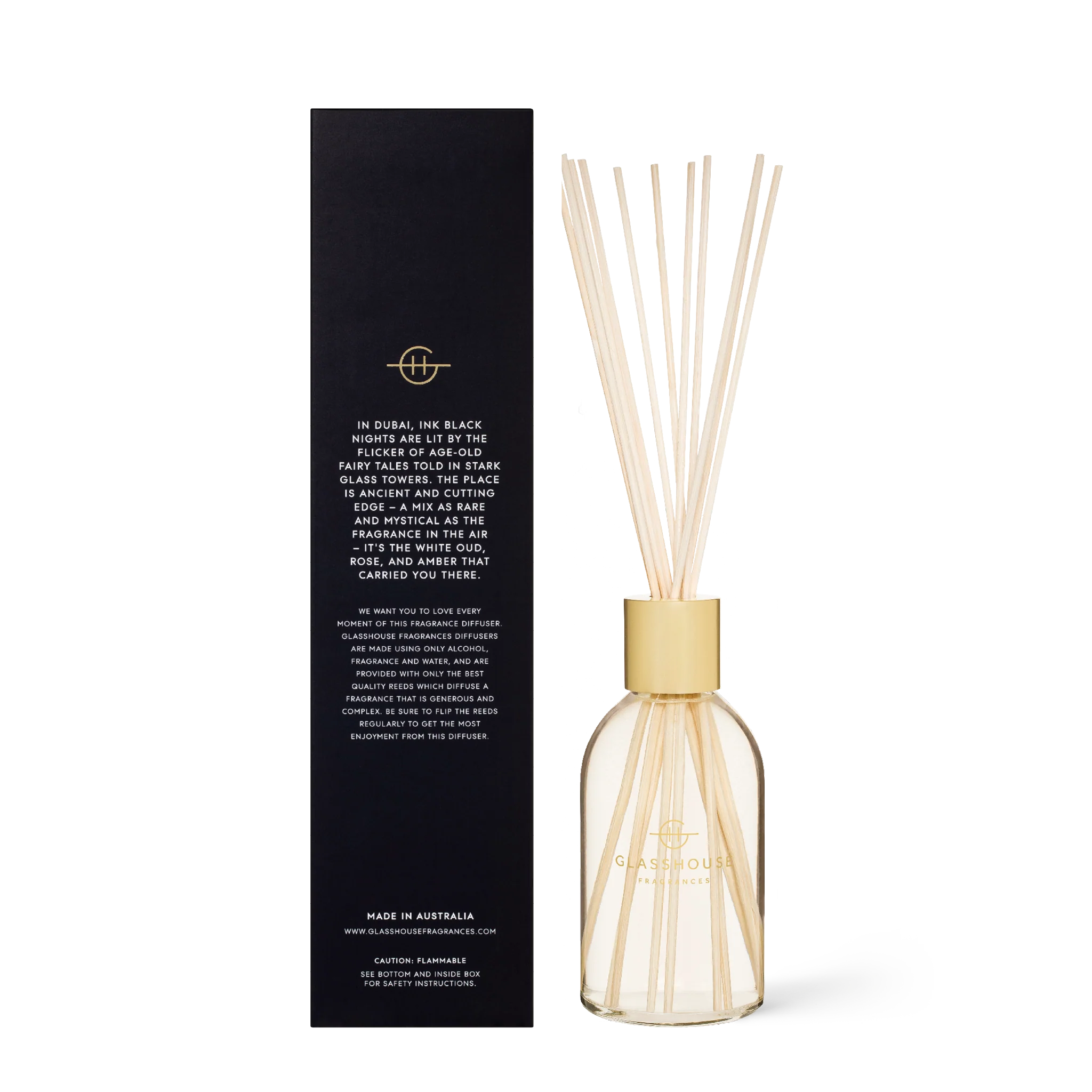 Glasshouse Fragrances Arabian Nights diffuser with intricate design and soft light, surrounded by aromatic elements.