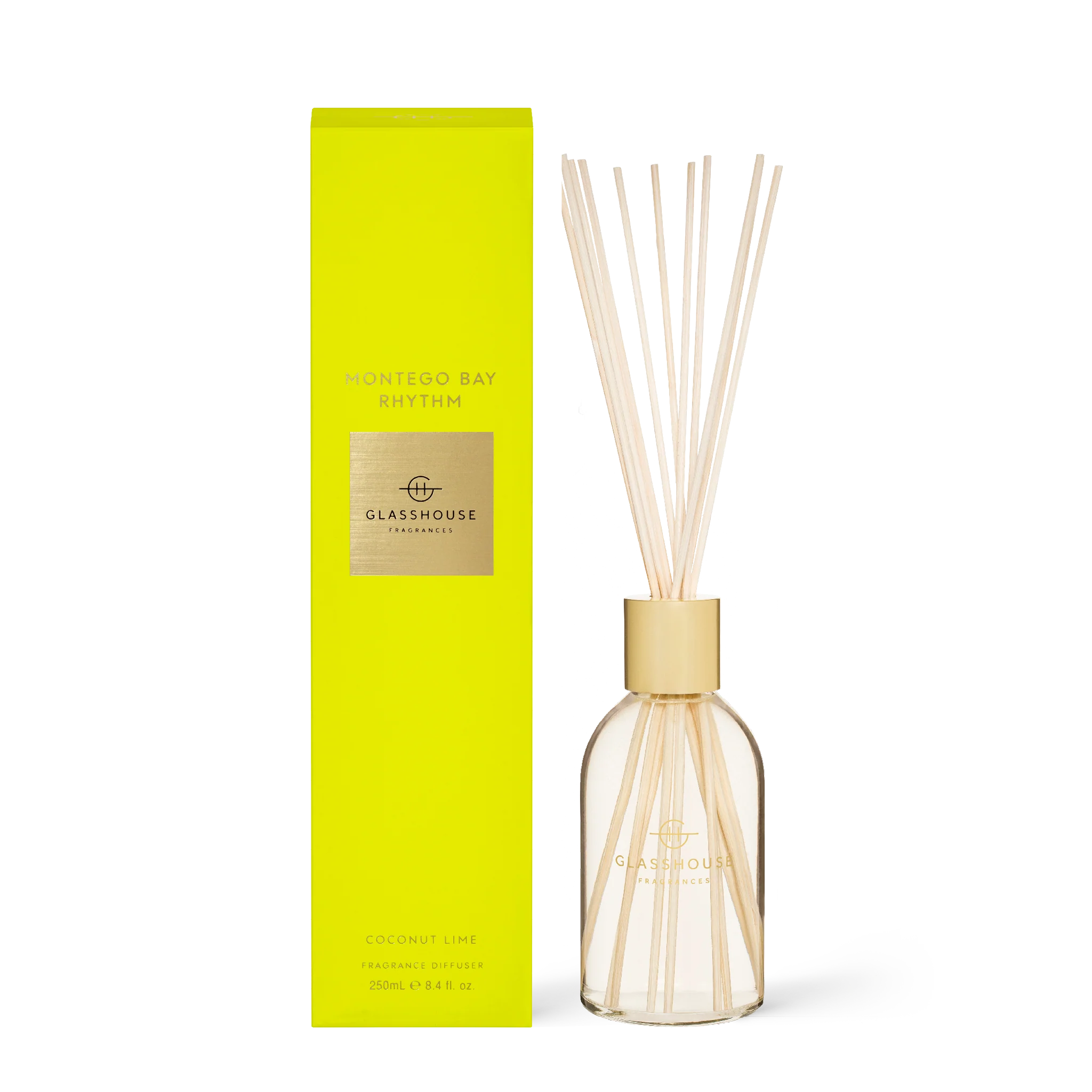 Glasshouse Fragrances Montego Bay Rhythm diffuser with glass bottle and reed sticks, showcasing a tropical-themed home fragrance.