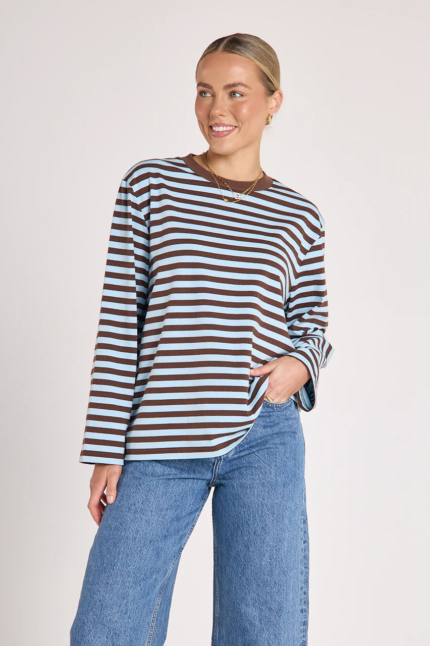 Feather + Noise Carter long sleeve tee in chocolate blue stripe, showing a close-up of the soft fabric and stylish striped design.
