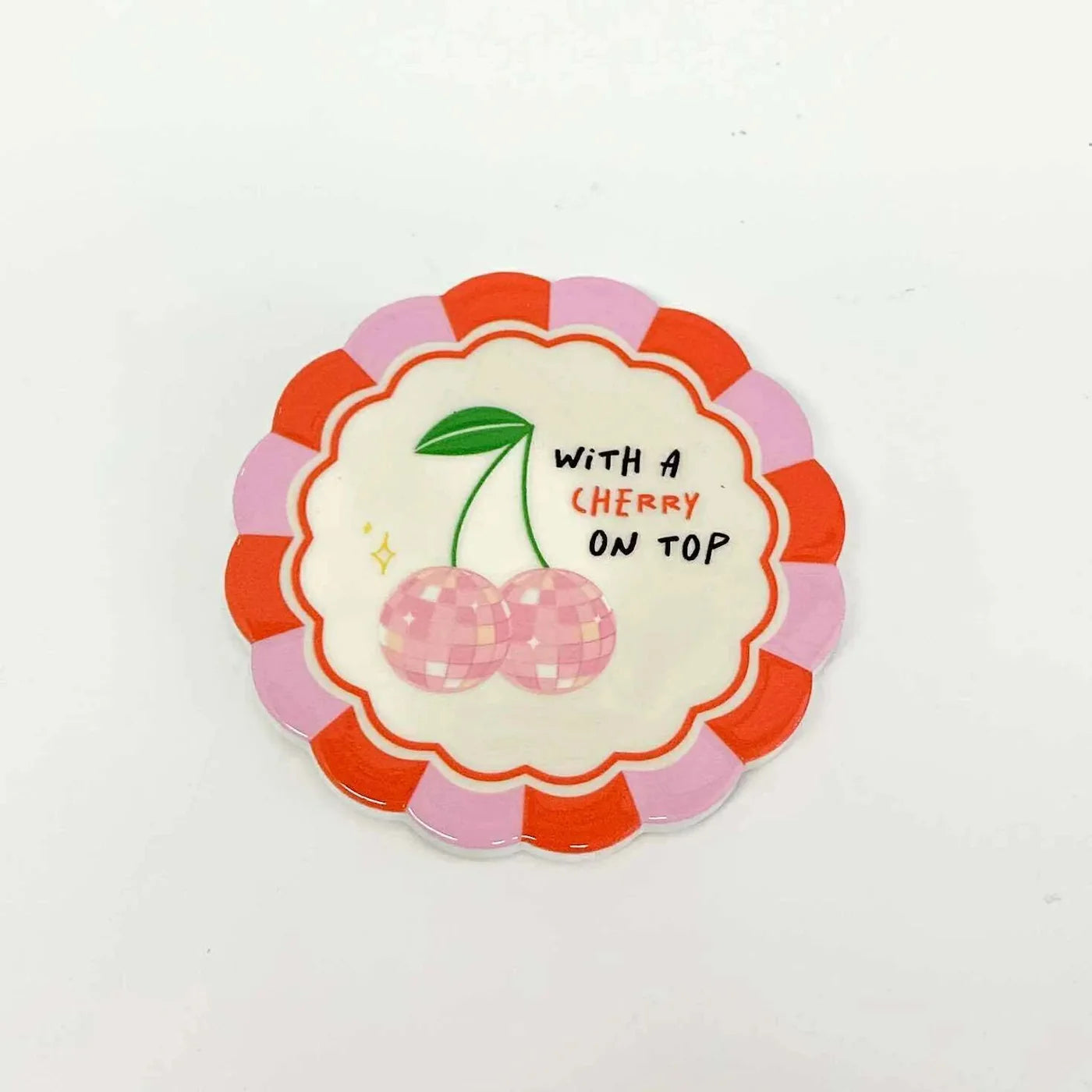 Coast to Coast Proverb ceramic coasters with colorful, patterned designs, stacked showing their decorative surfaces.