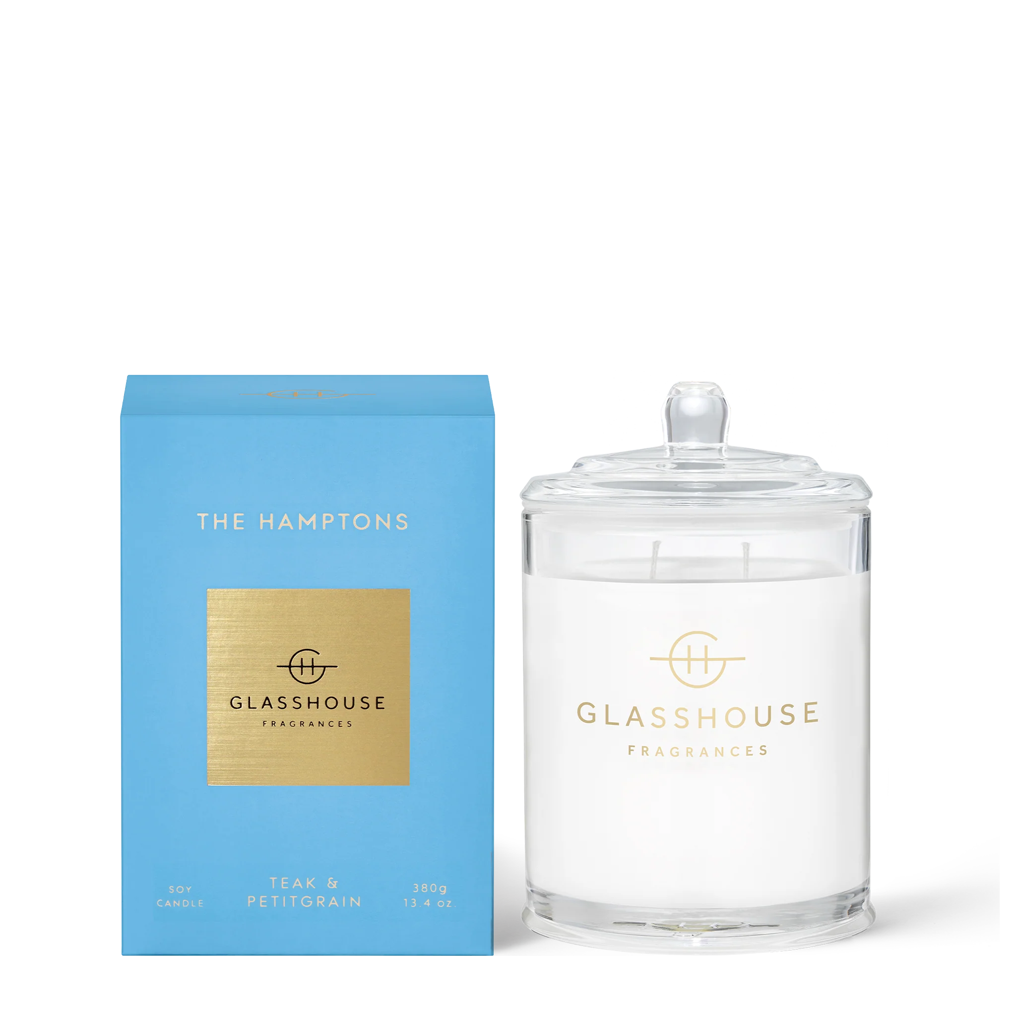 Glasshouse Fragrances The Hamptons Soy Candle in 380g glass jar with a soft glow and elegant design.
