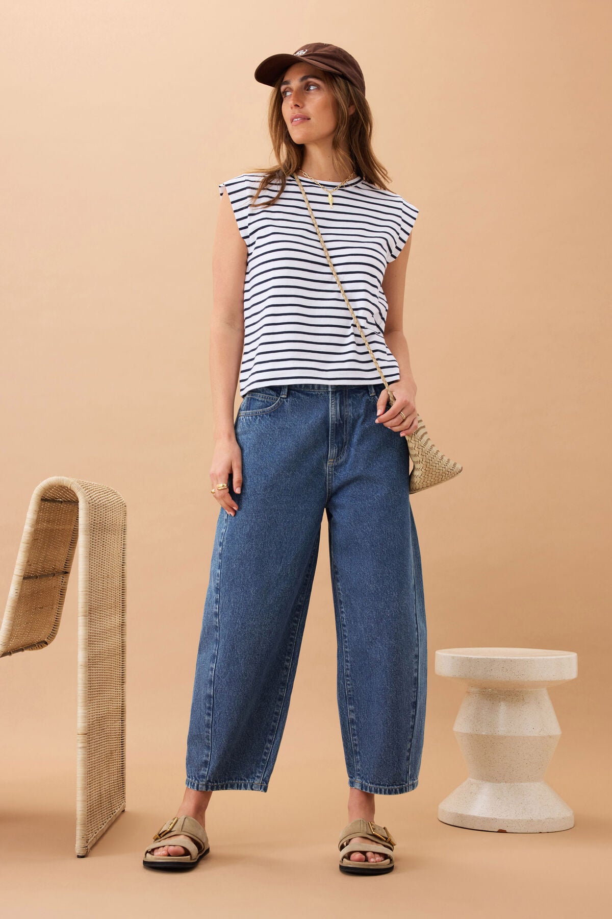 Ceres Life Maggie tapered barrel jeans in fresh indigo denim, showcasing a fitted style with classic stitching and a tapered leg fit.
