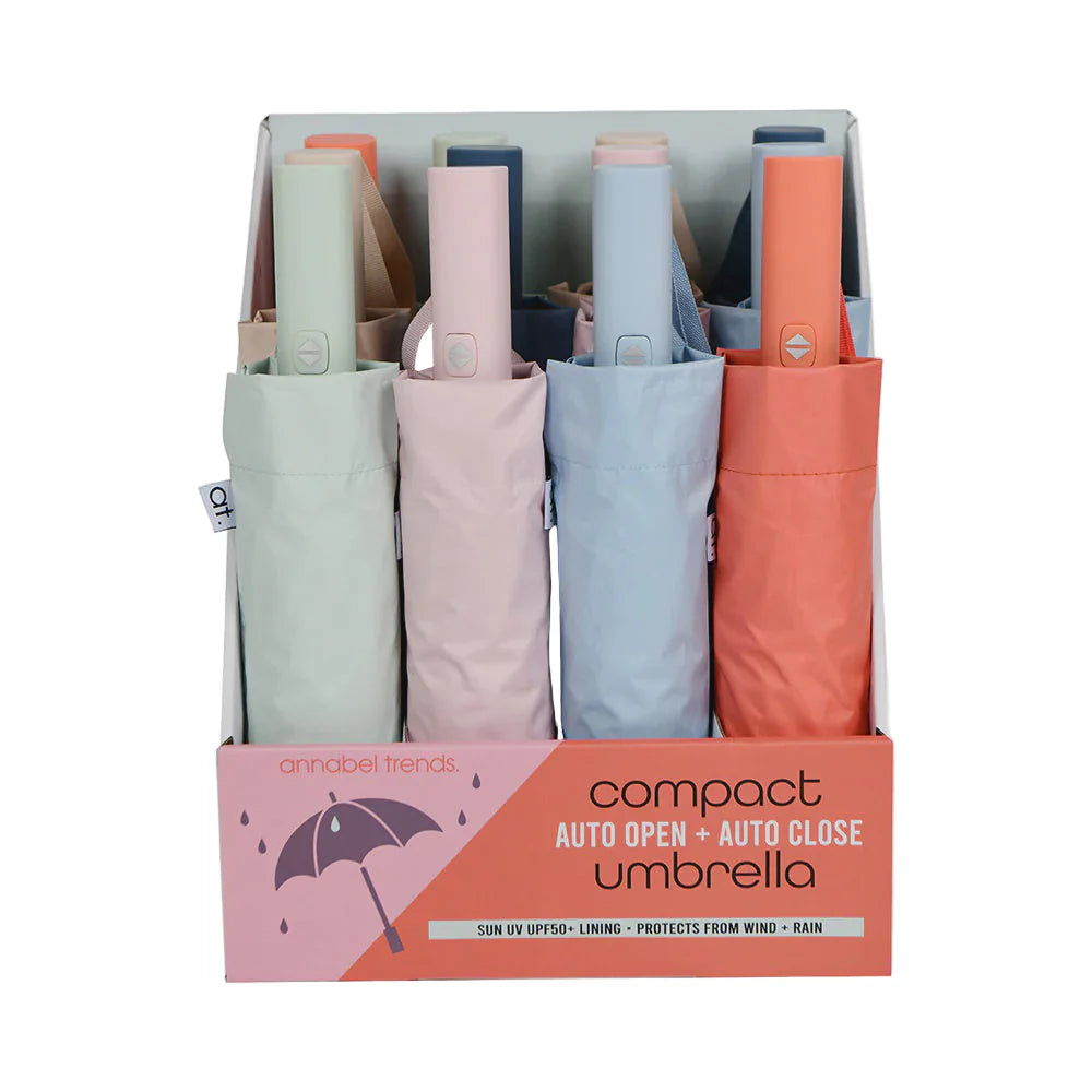 Annabel Trends compact auto open and close umbrella with navy blue canopy, lightweight design, and ergonomic handle.