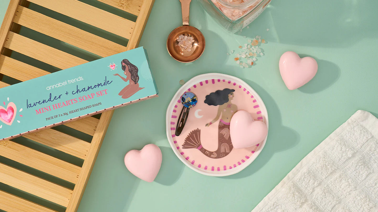 Lavender and chamomile mini hearts soap set by Annabel Trends, featuring floral-shaped soaps with calming purple and white colors.