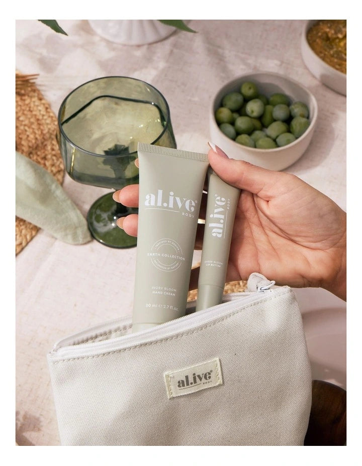 Ivory Bloom Hand and Lip Set by Al.ive Body featuring eco-friendly packaging and floral-inspired design.