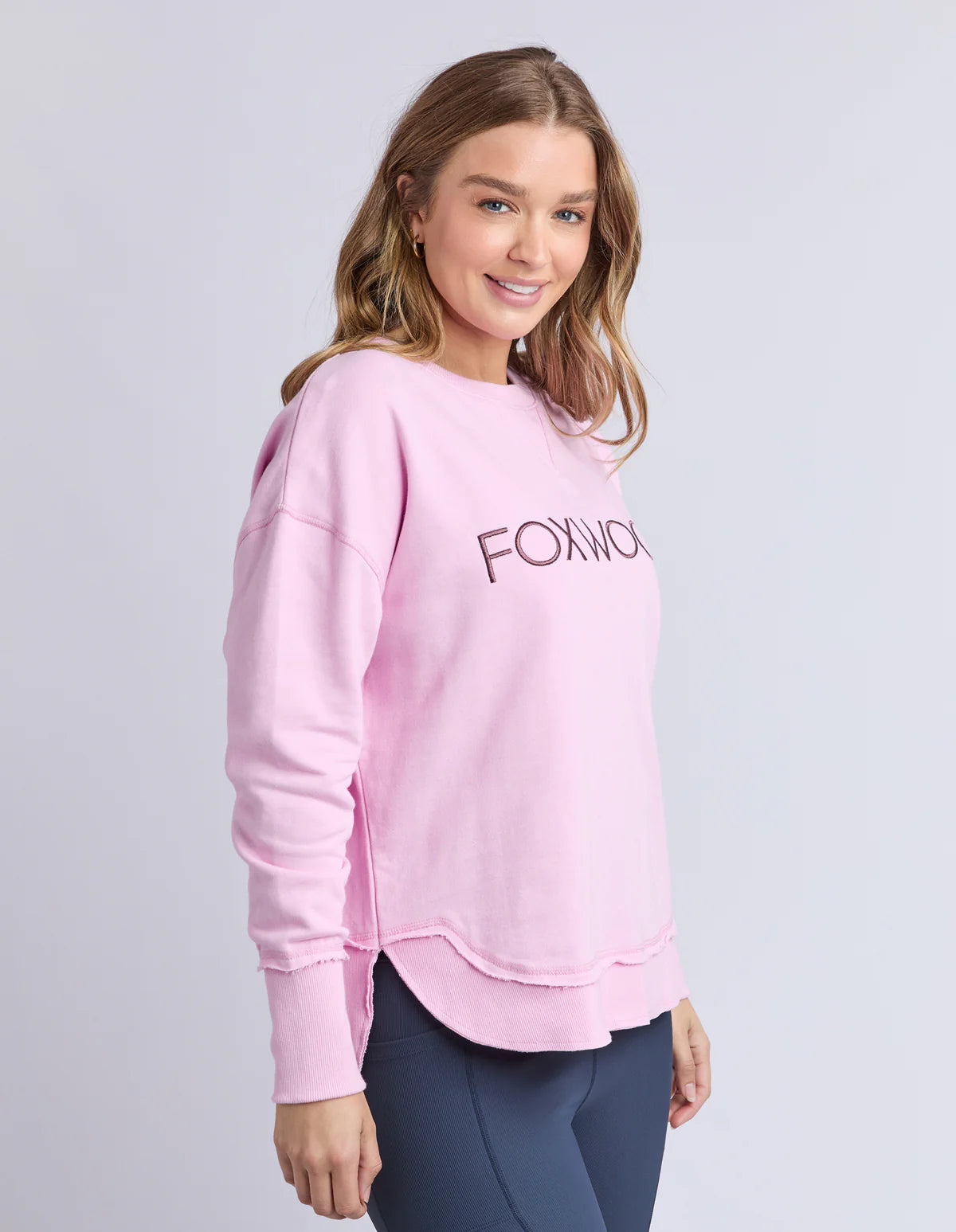 Bright pink Simplified Metallic Crew sock by Foxwood, showcasing a close-up of the vibrant, shiny fabric and comfortable fit.