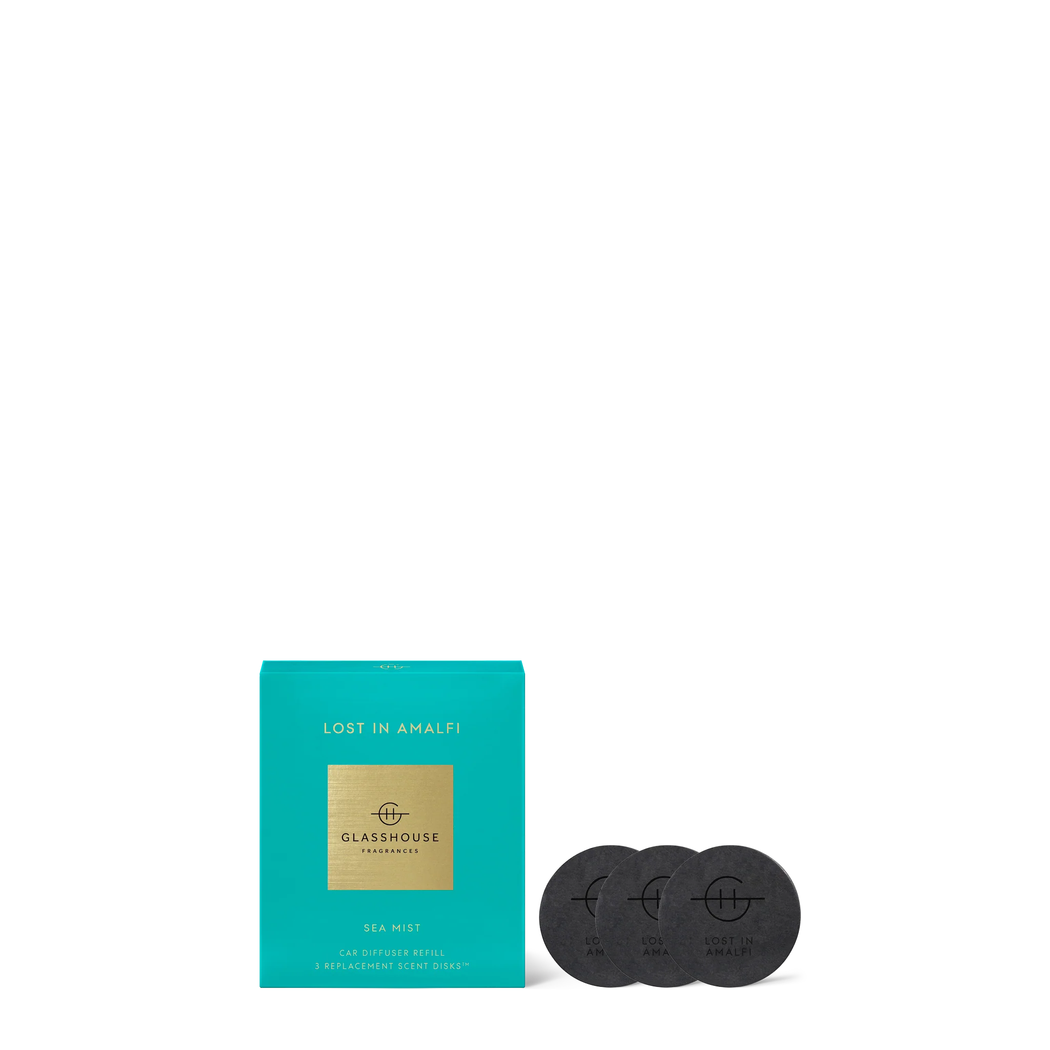 Glasshouse Fragrances LOST IN AMALFI Sea Mist scented candle with a sleek glass container and a soft, calming appearance.