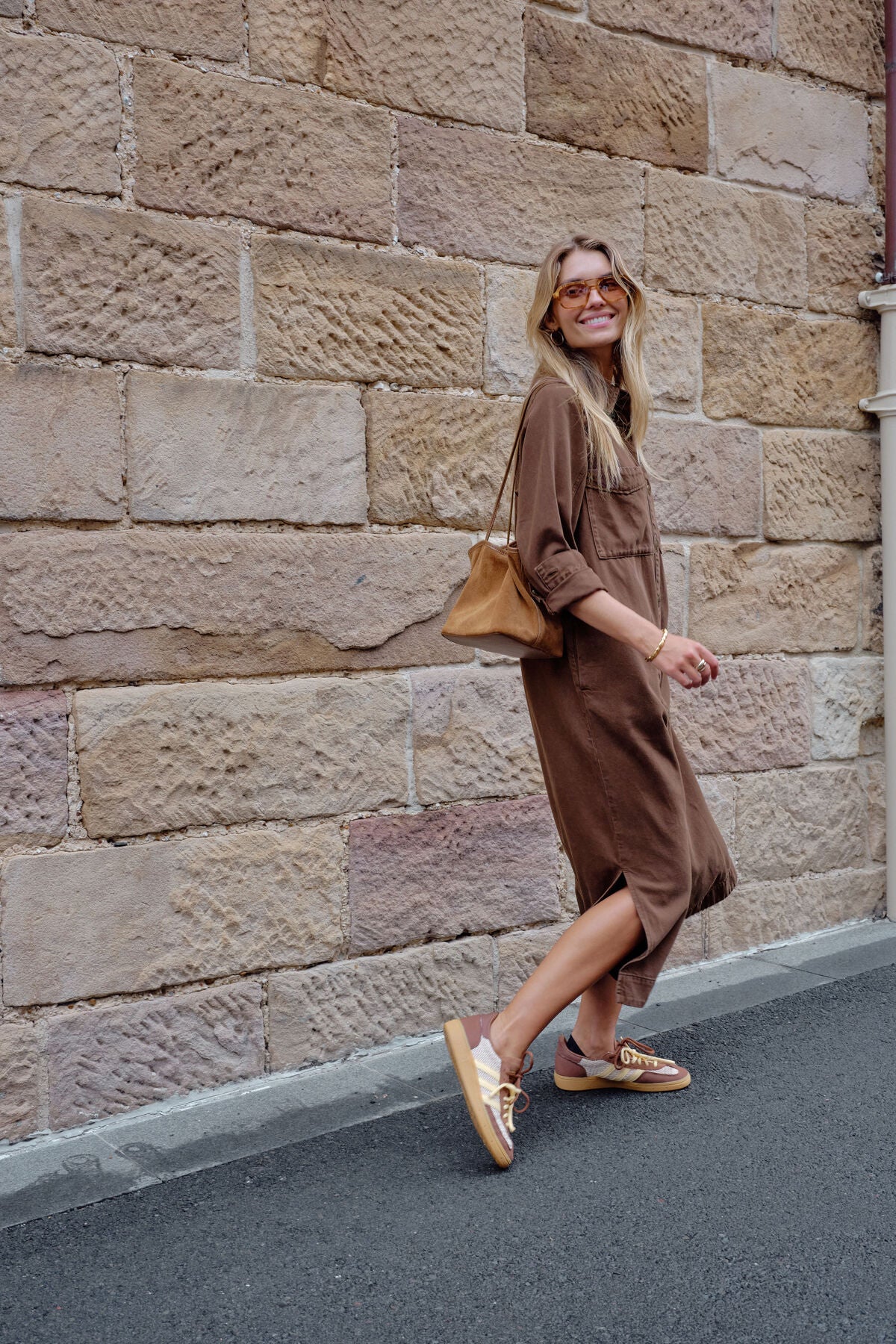 Ceres Life Rae long sleeve midi dress in chocolate color, featuring a fitted silhouette and elegant knee-length design.